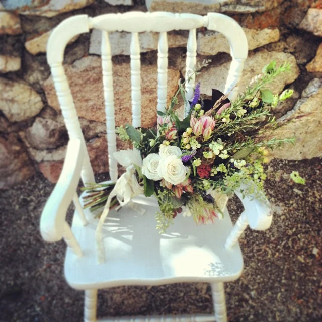 Bouquet on a chair.