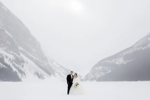 Lydia + Daniel: Winter Mountain Wedding at Lake Louise, Alberta