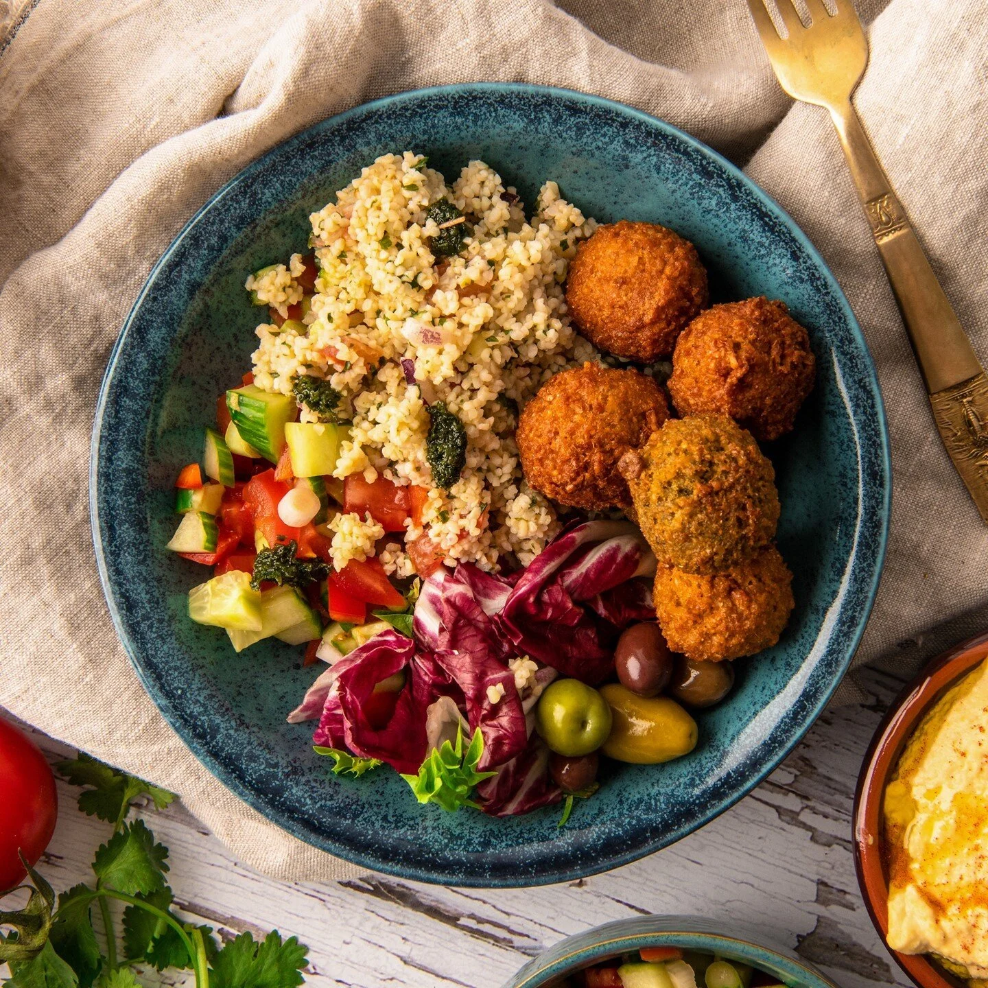 Summer in a bowl ☀️

Grab some of Yossi's falafel out of the freezer, pop them in the oven to crisp up and serve with crunchy salad, tabbouleh, olives and then drizzle with coriander &amp; chilli paste.

The perfect feel good summer salad (even if it