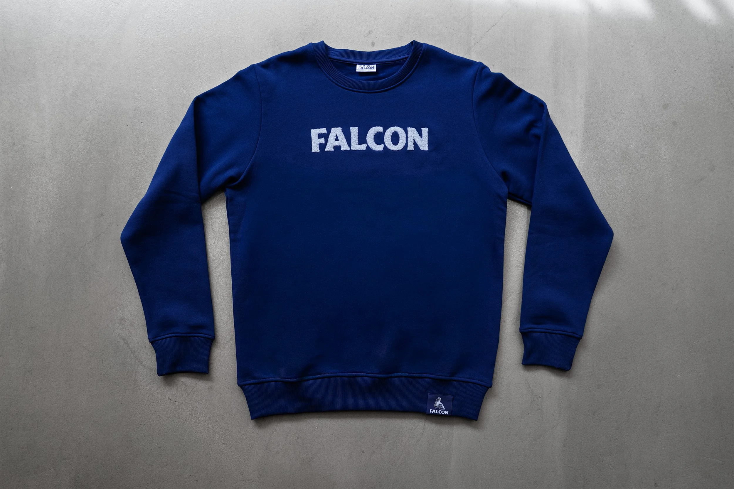26_05_Falcon_Merch_Sweater 1_Front.jpg