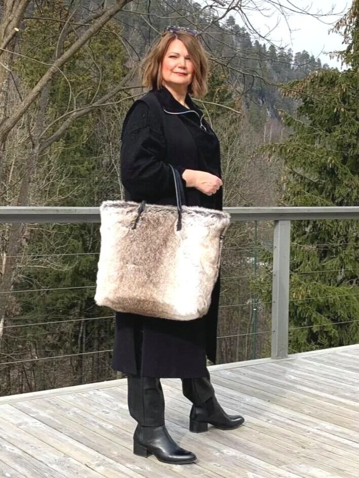 Four outfits with the Wolf Tote Bag