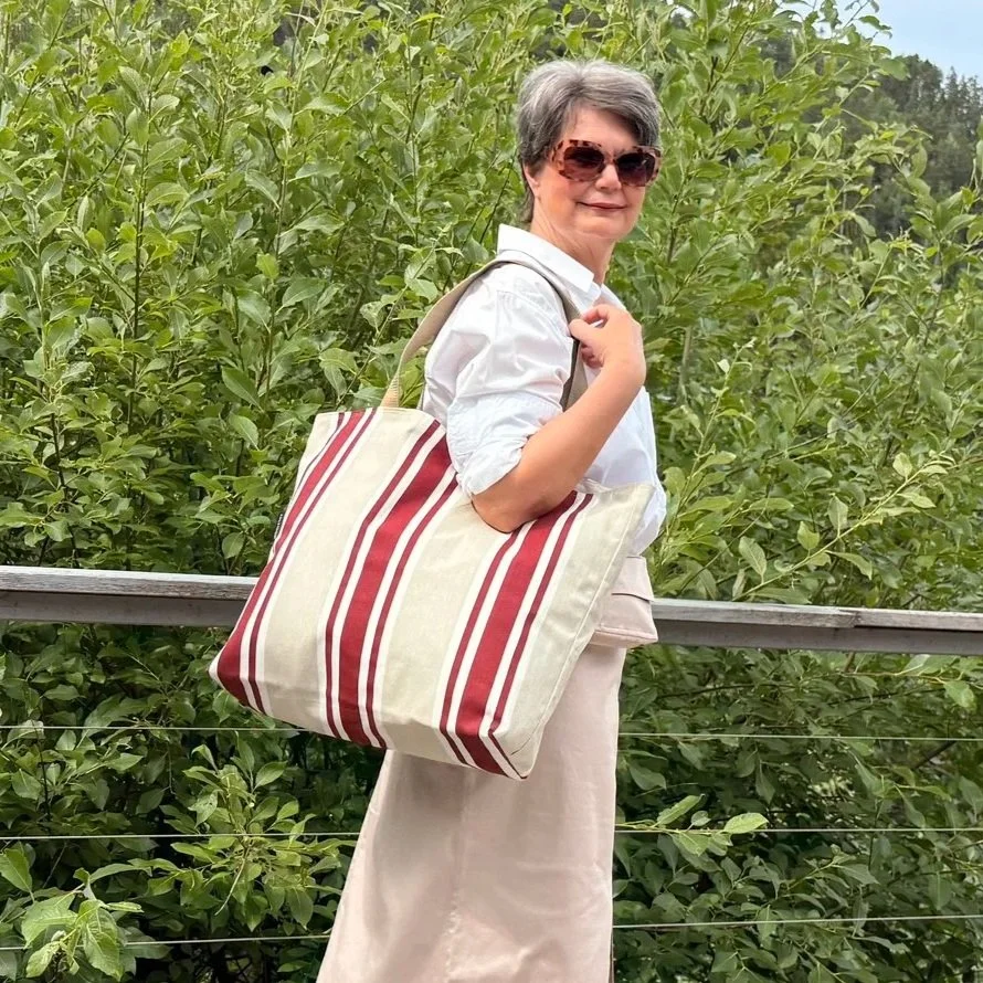 Handmade extra large canvas tote bag with bold red, white, and beige vertical summer stripes.