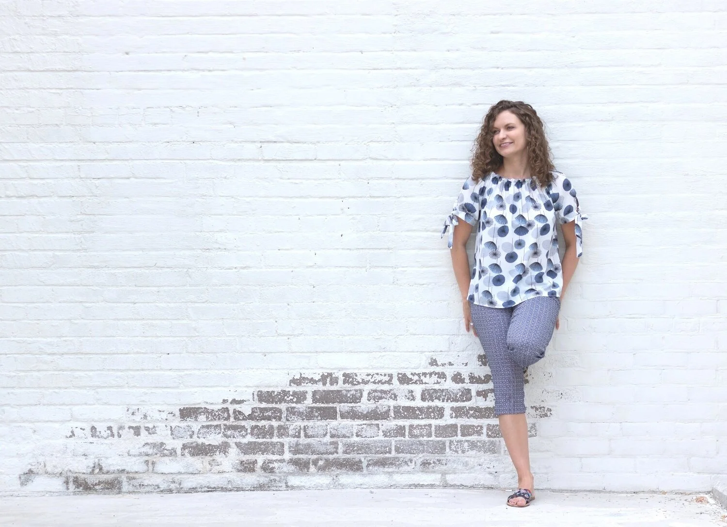  Here's an example of a photo where I'm standing against a white wall with ample space to add text on the side. 