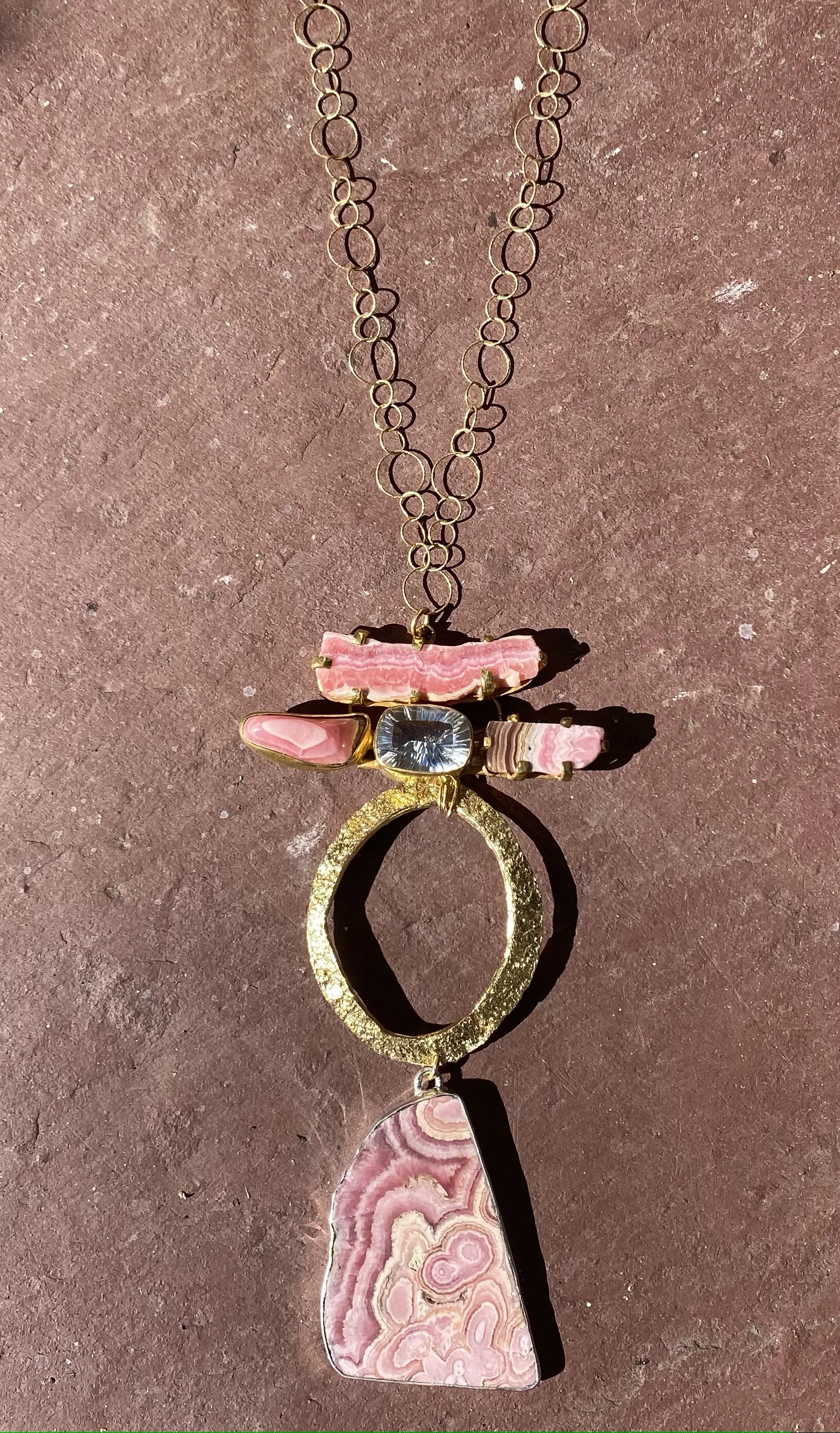 Rhodochrosite and Crystal Quartz on Gold Circle Chain $182.jpg