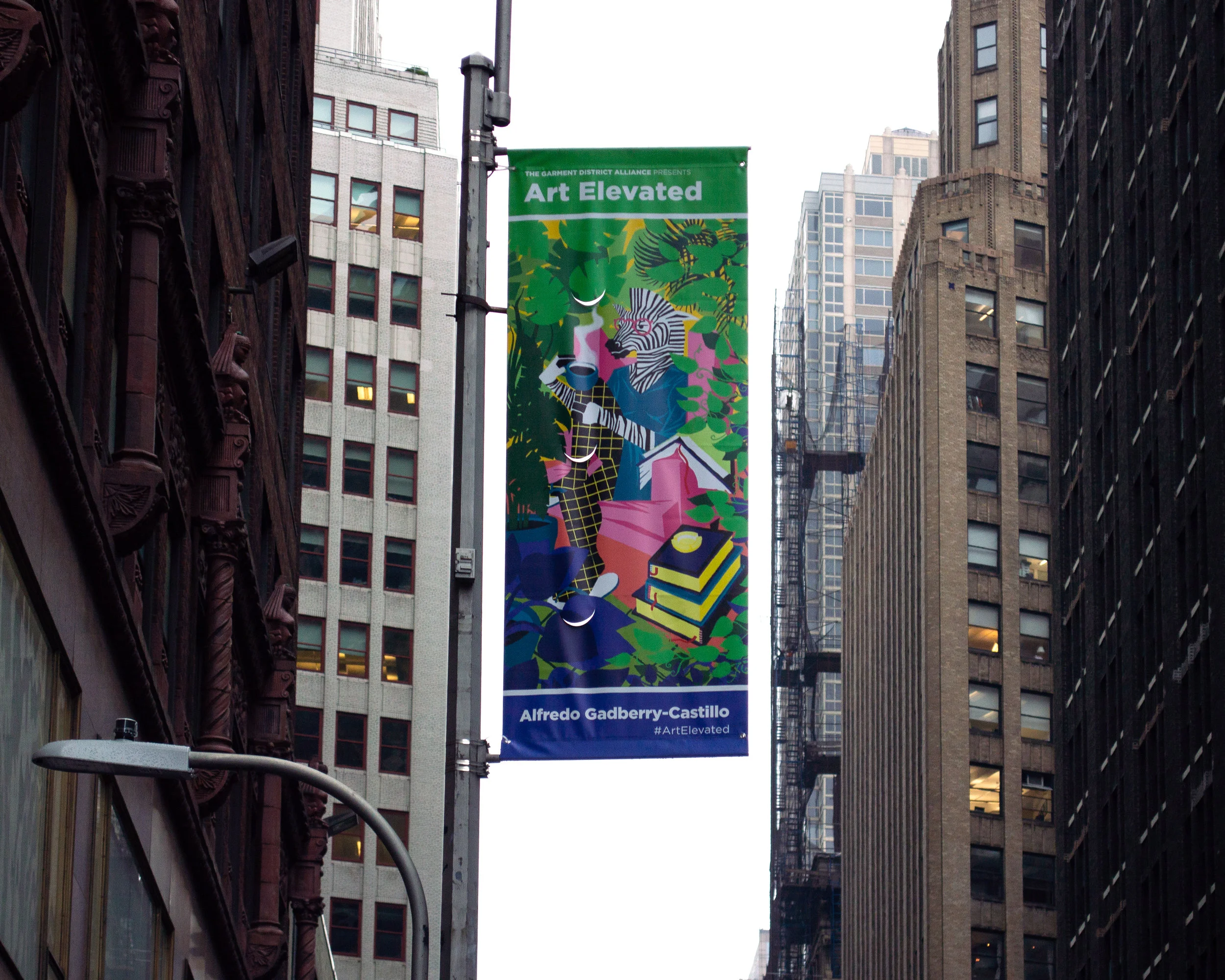 Zebra Lady “Zebra Lady”was selected for #ArtElevated , the first street exhibition organized by Orangenius and the The Garment District , on display on 38th Street in Manhattan.