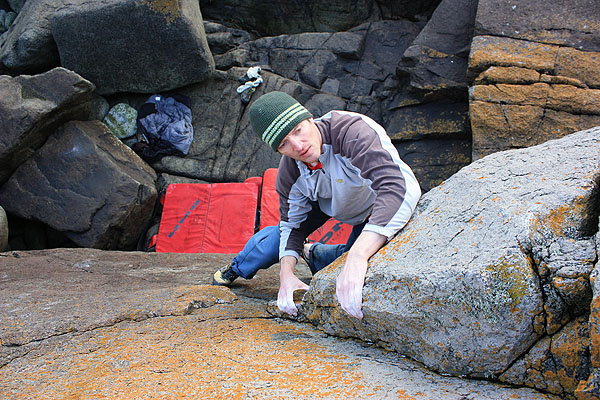 Simon Panton on Atlantic Fin Groove 4c (V0+) at Porth Nefoedd. Photo: Jon Ratcliffe