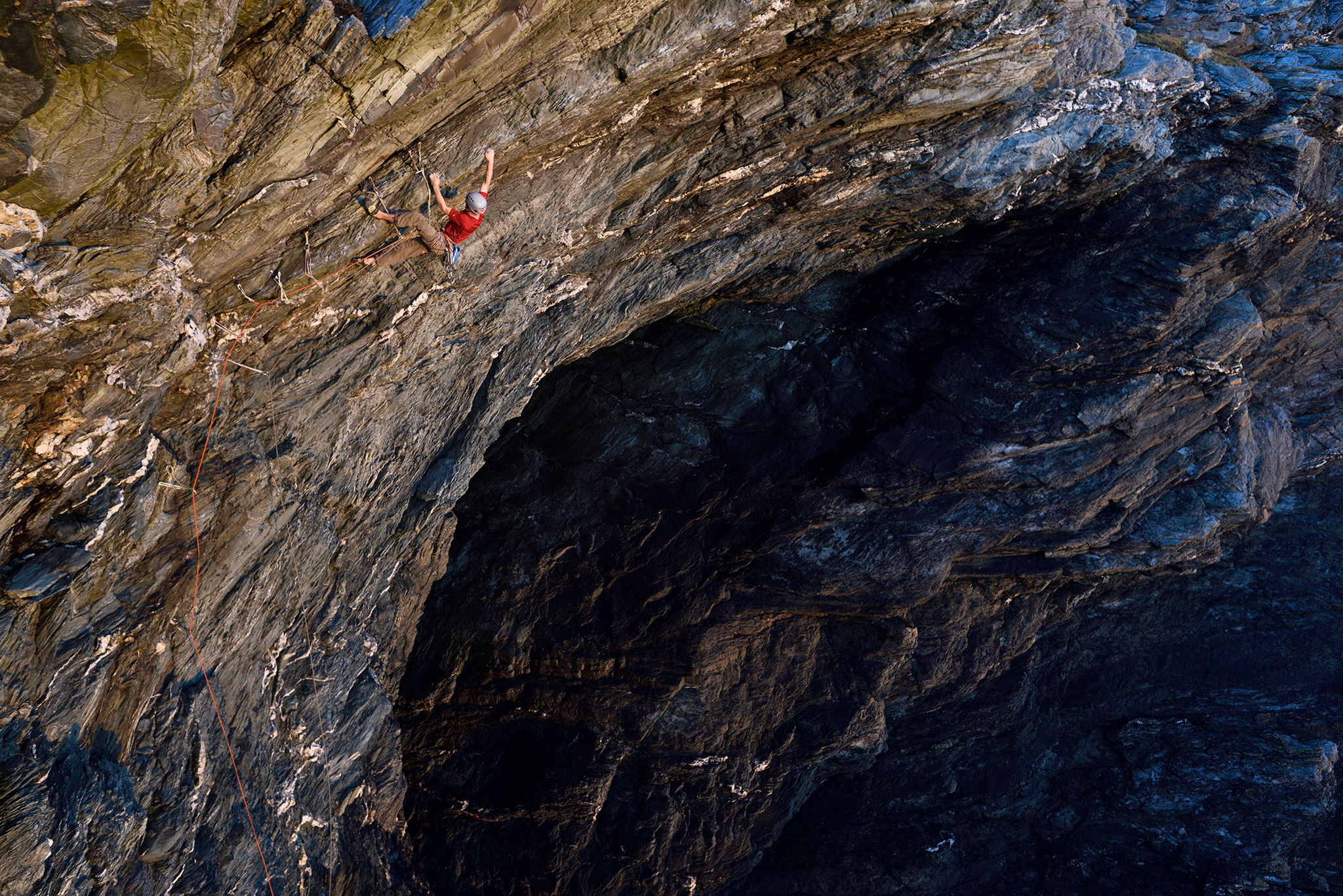 James McHaffie on the first ascent of Nightmare Inauguration (E8 6b) Porth Dafarch, Anglesey, North Wales.