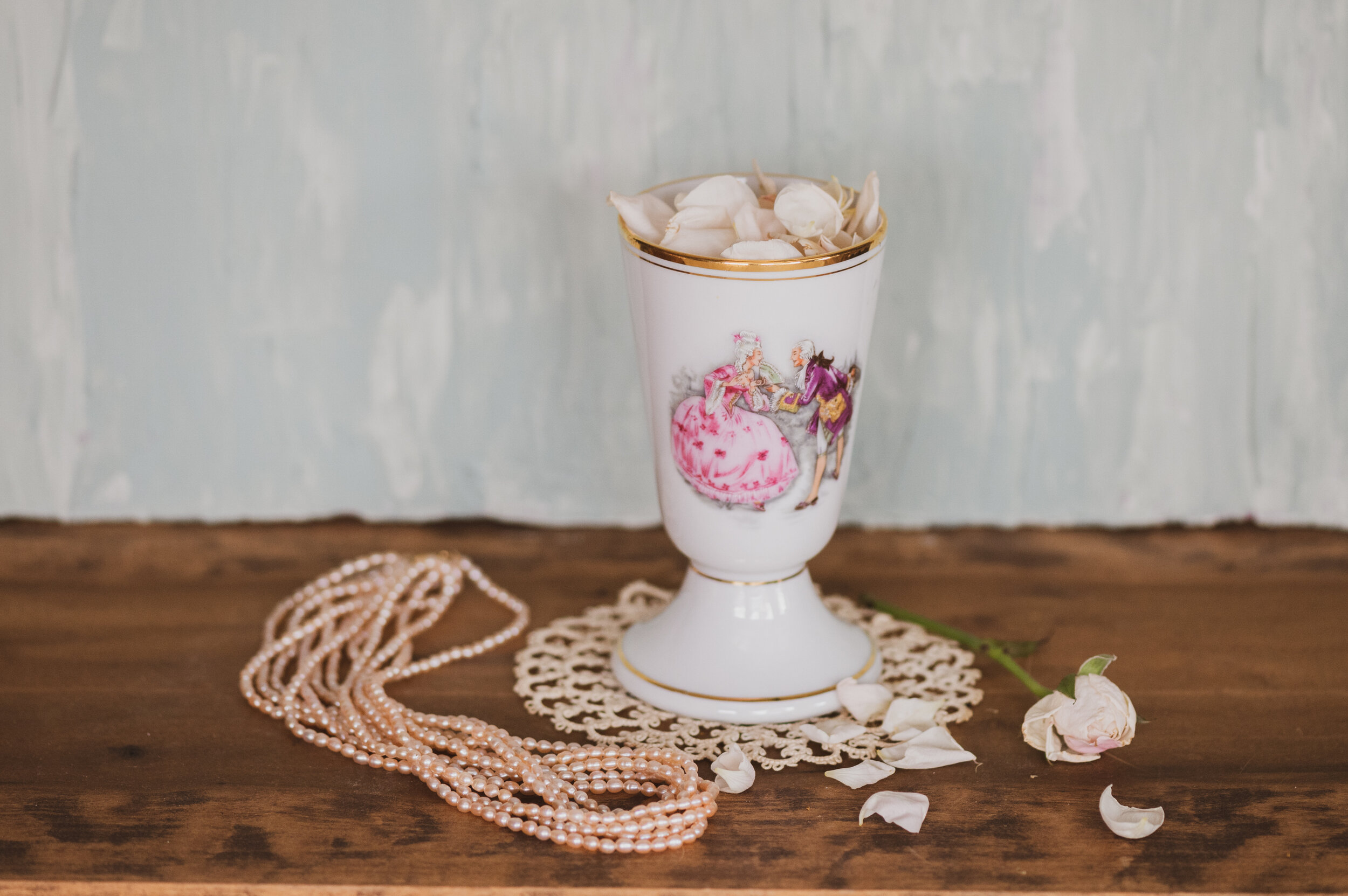 antique-vase-egg-cup-rose-flower-doily.jpg