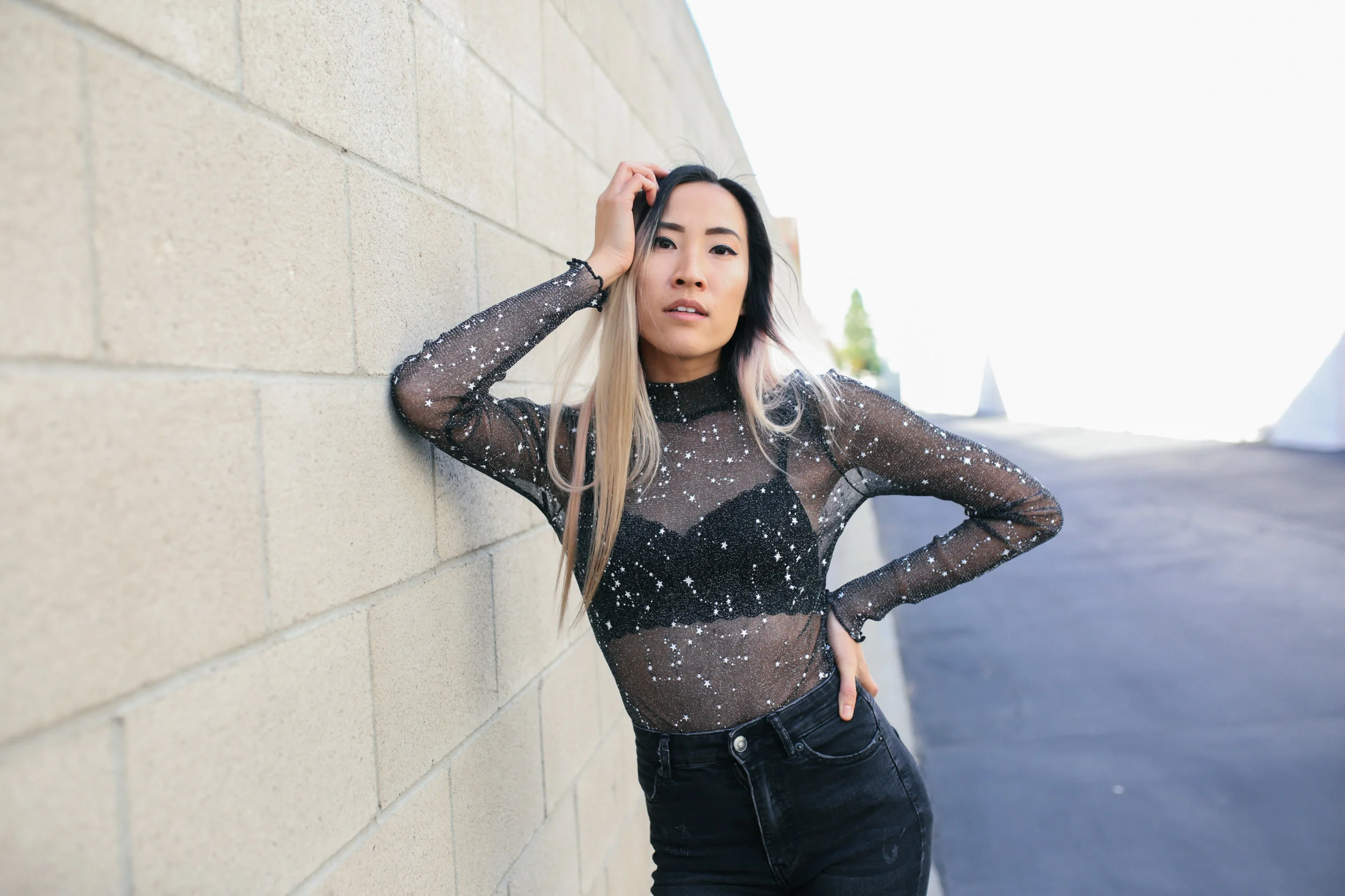 black sheer top with pearls