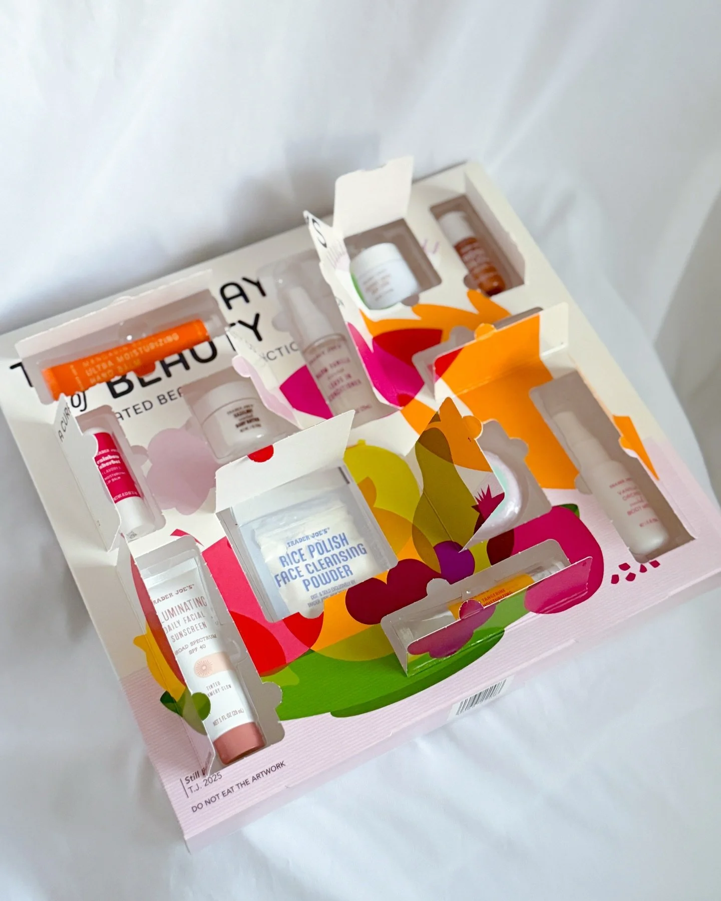 Opened the @traderjoes #12daysofbeauty #adventcalendar, and the products I&rsquo;d use the most:
&bull; illuminating daily facial sunscreen spf 40 (tinted)
&bull; mandarin basil ultra moisturizing hand balm 
&bull; pomegranate berry flavored lip butt