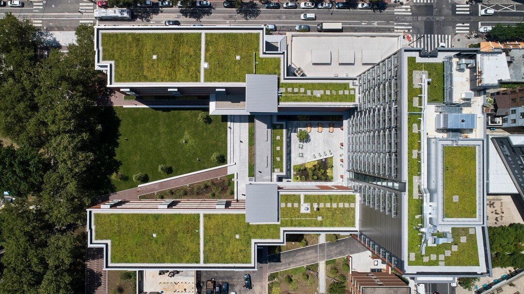 Emerald-green sedum-covered roofs of the Gutmann College House work to absorb stormwater and reduce urban heat on the Penn campus. Named in honor of Penn's former President Amy Gutmann, the College House was designed by Bohlin-Cywinski Jackson Archit