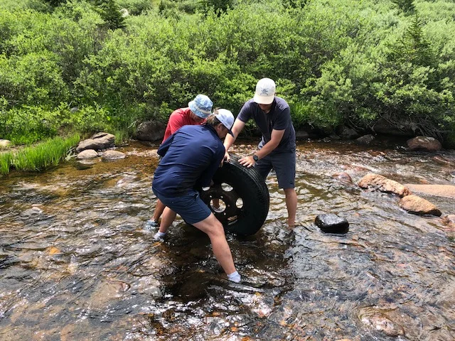 Removing a 300lb (debris-filled) tire from the headwaters of the Roaring Fork River