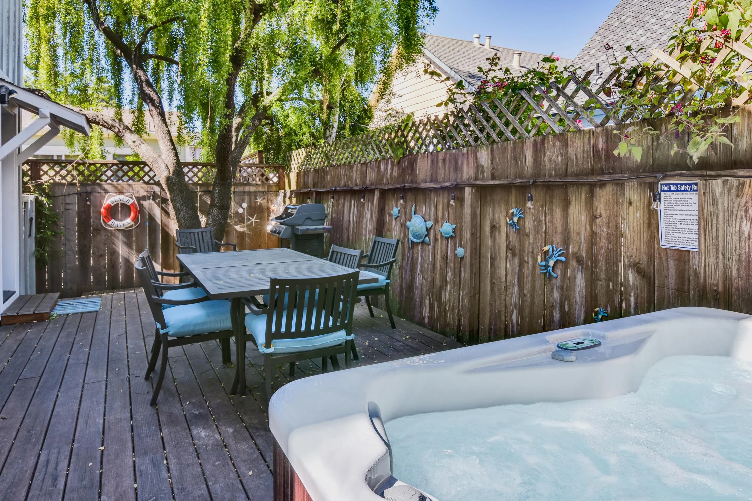 NEW: New deck with private hot tub, outdoor dining and gas Weber barbecue.