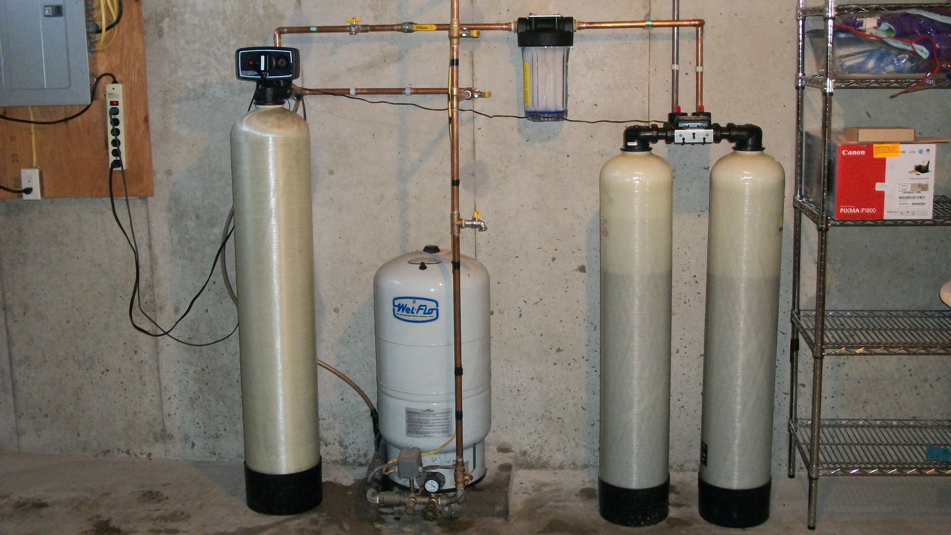 Basic backwashing filter and twin tank arsenic treatment system