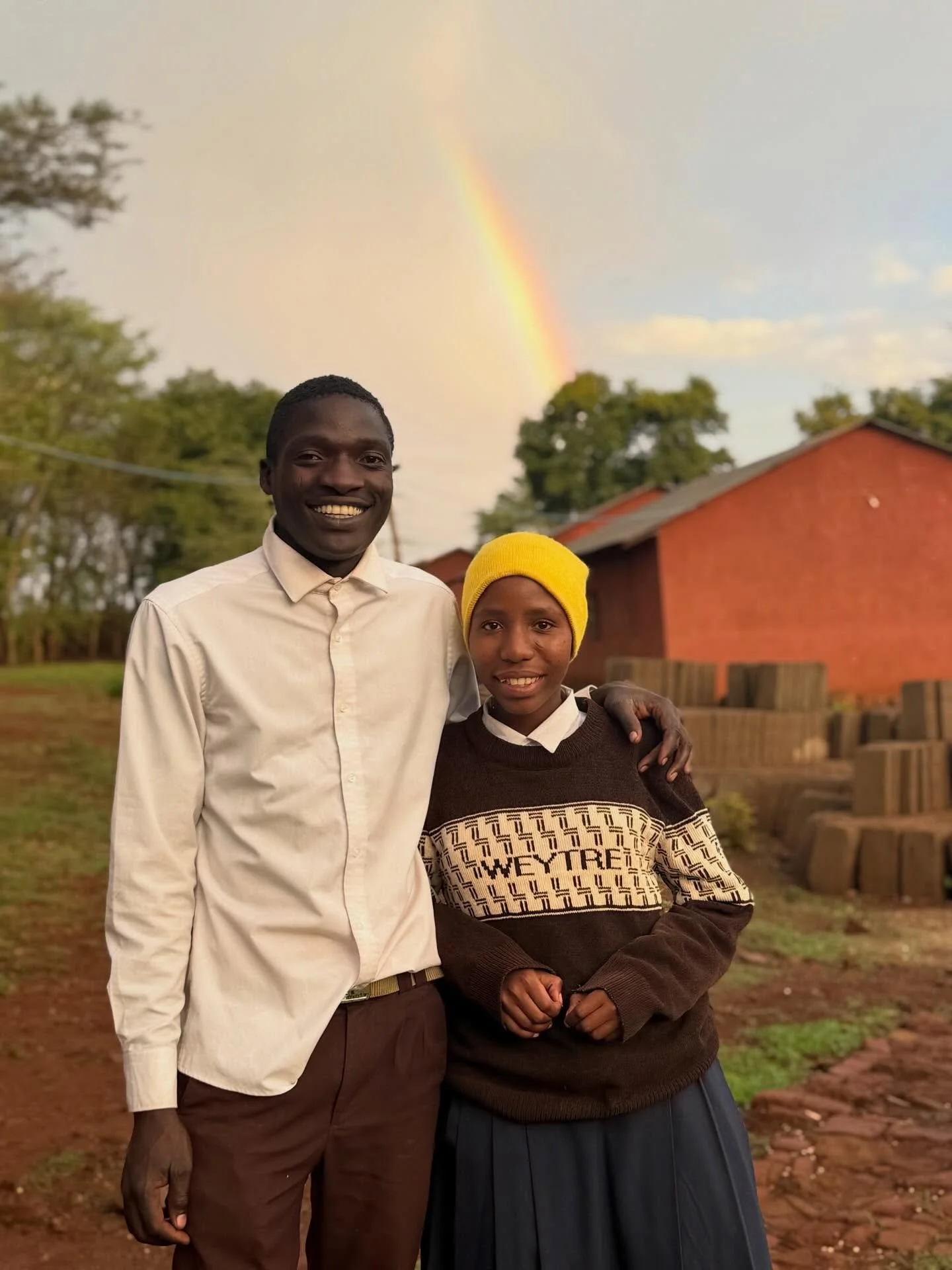 Back at school and under the rainbow with Eliza and Juli, two of our sponsored scholarship students. 

We had such a heartwarming day spending time with them and hearing many stories. Eliza shared how excited she was to see her friends again. Juli is