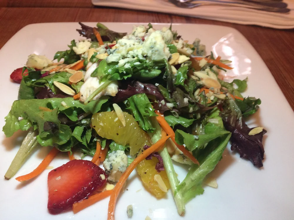  Ponchatoula Strawberry Salad  Local mixed greens, citrus supremes &amp; bleu cheese with a satsuma poppy seed vinaigrette. 