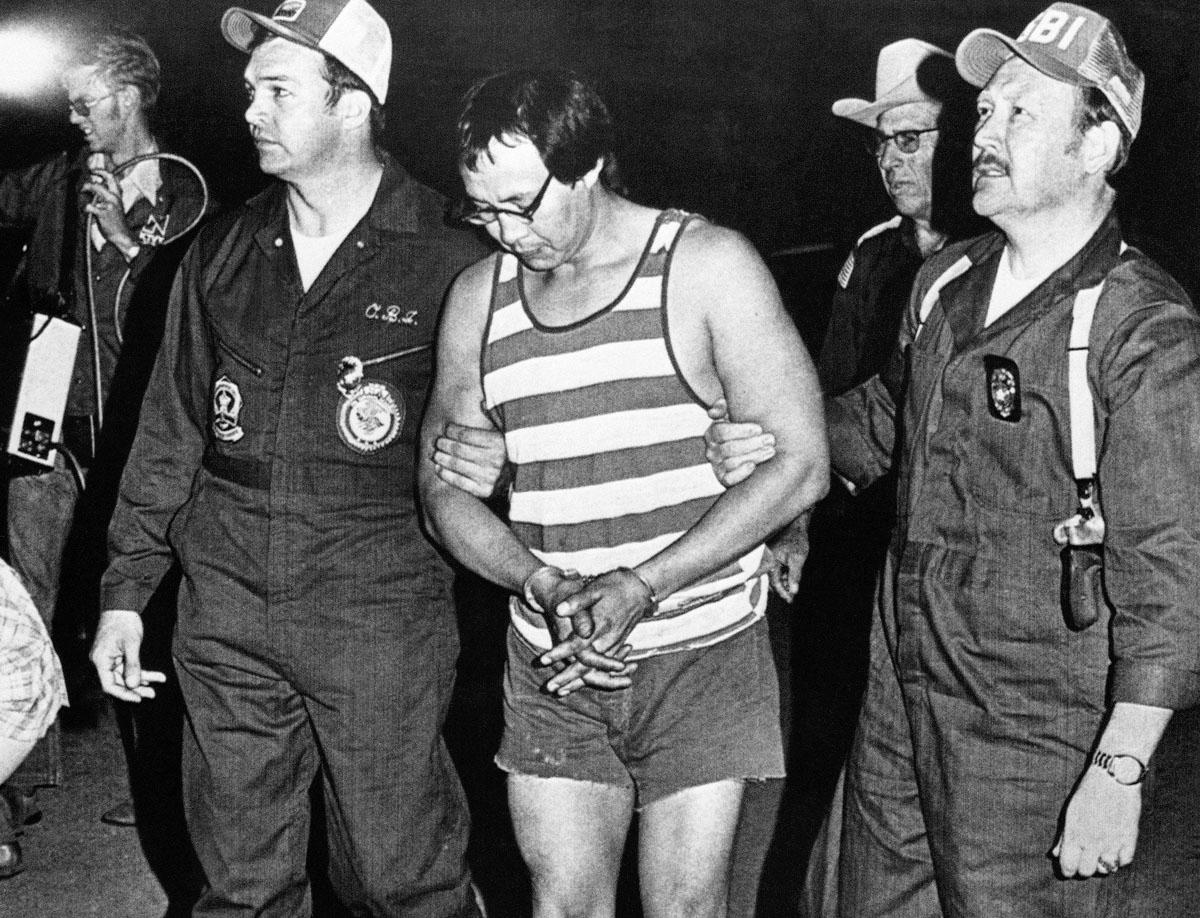 Hart being taken into custody. Via NY Daily News