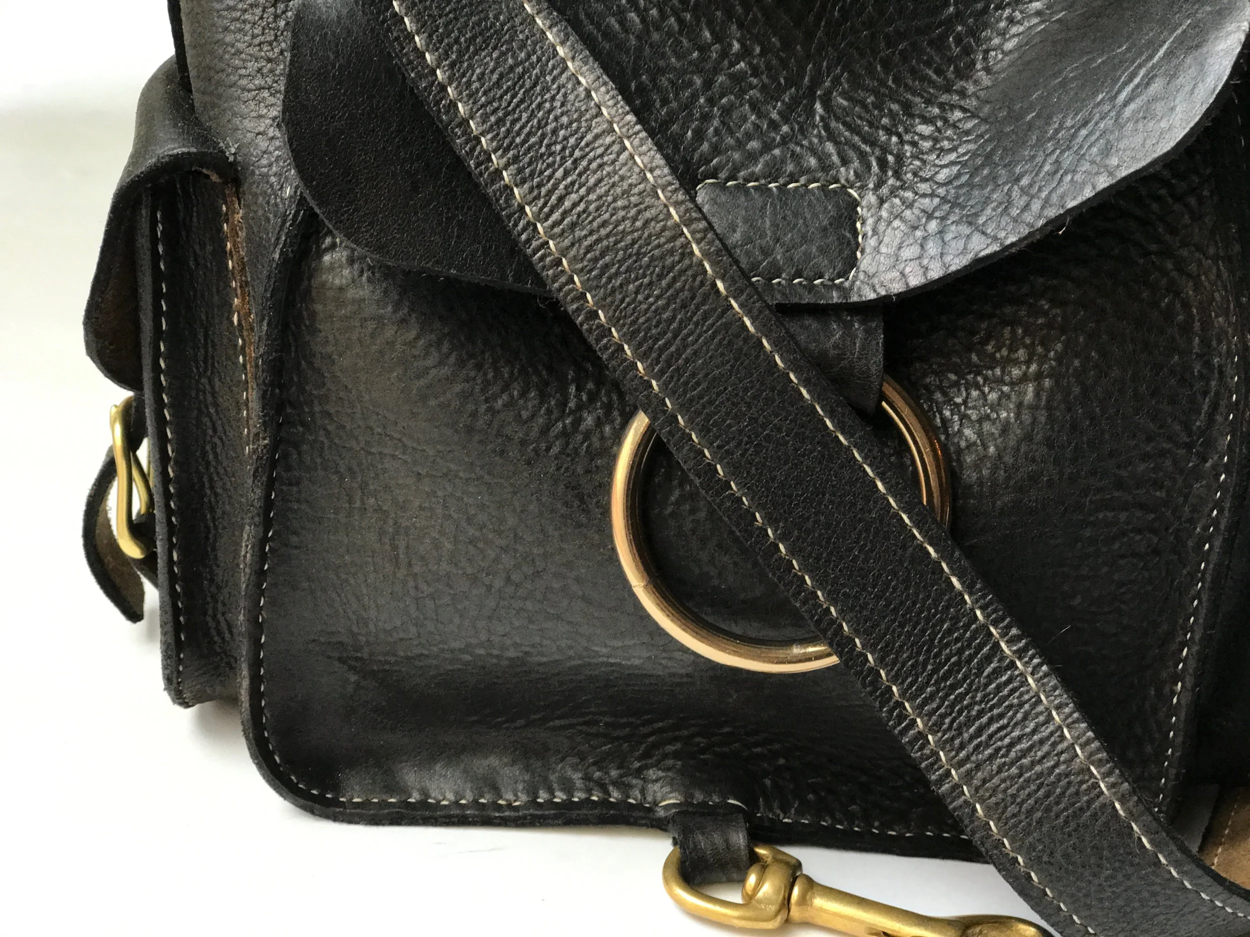 traditional leatherwork, saddle-stitched leather goods, leather handbag