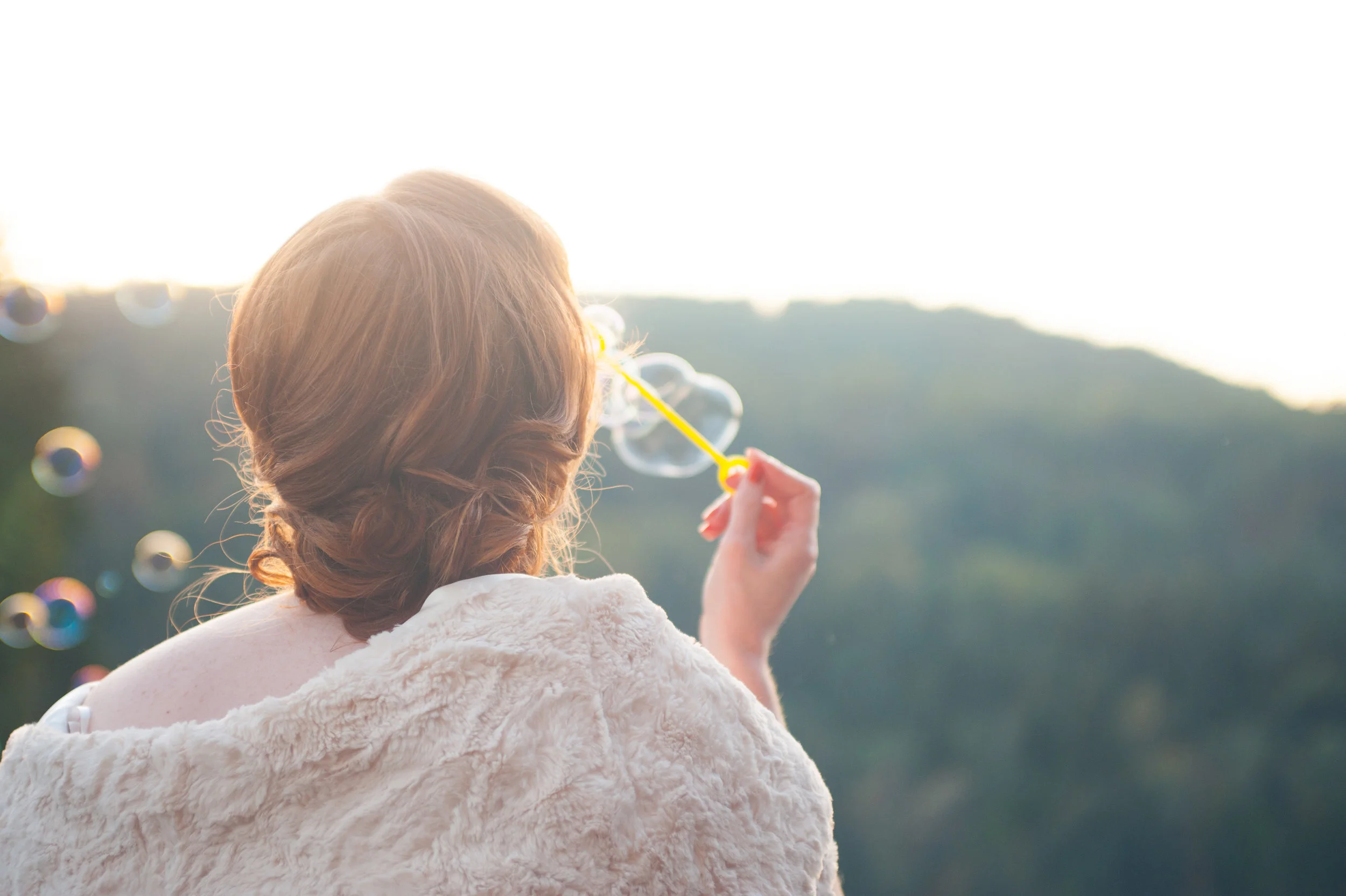 Bride Blows Bubbles at Dusk - Seattle Wedding 