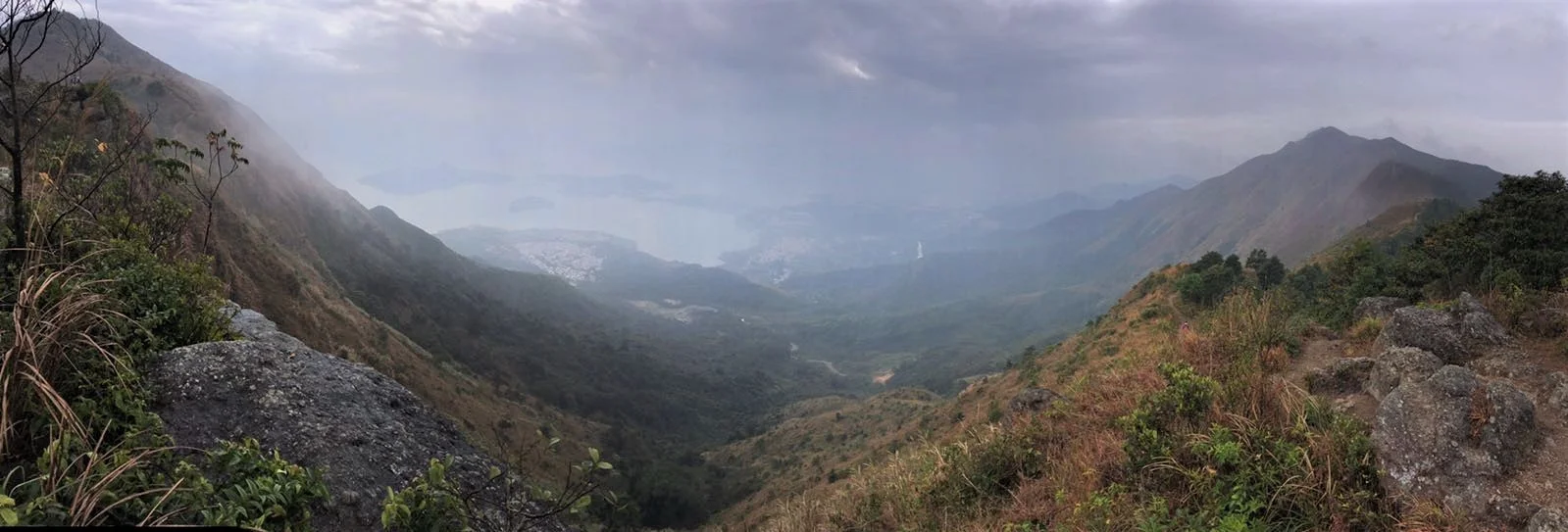 The panoramic view of Hong Kong on one side of The Immortals