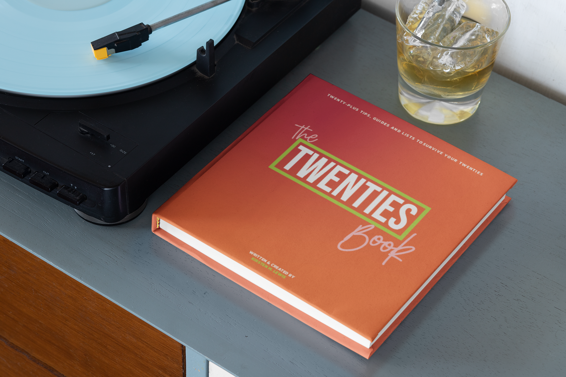 mockup-of-a-squared-book-next-to-a-record-player-33907.png