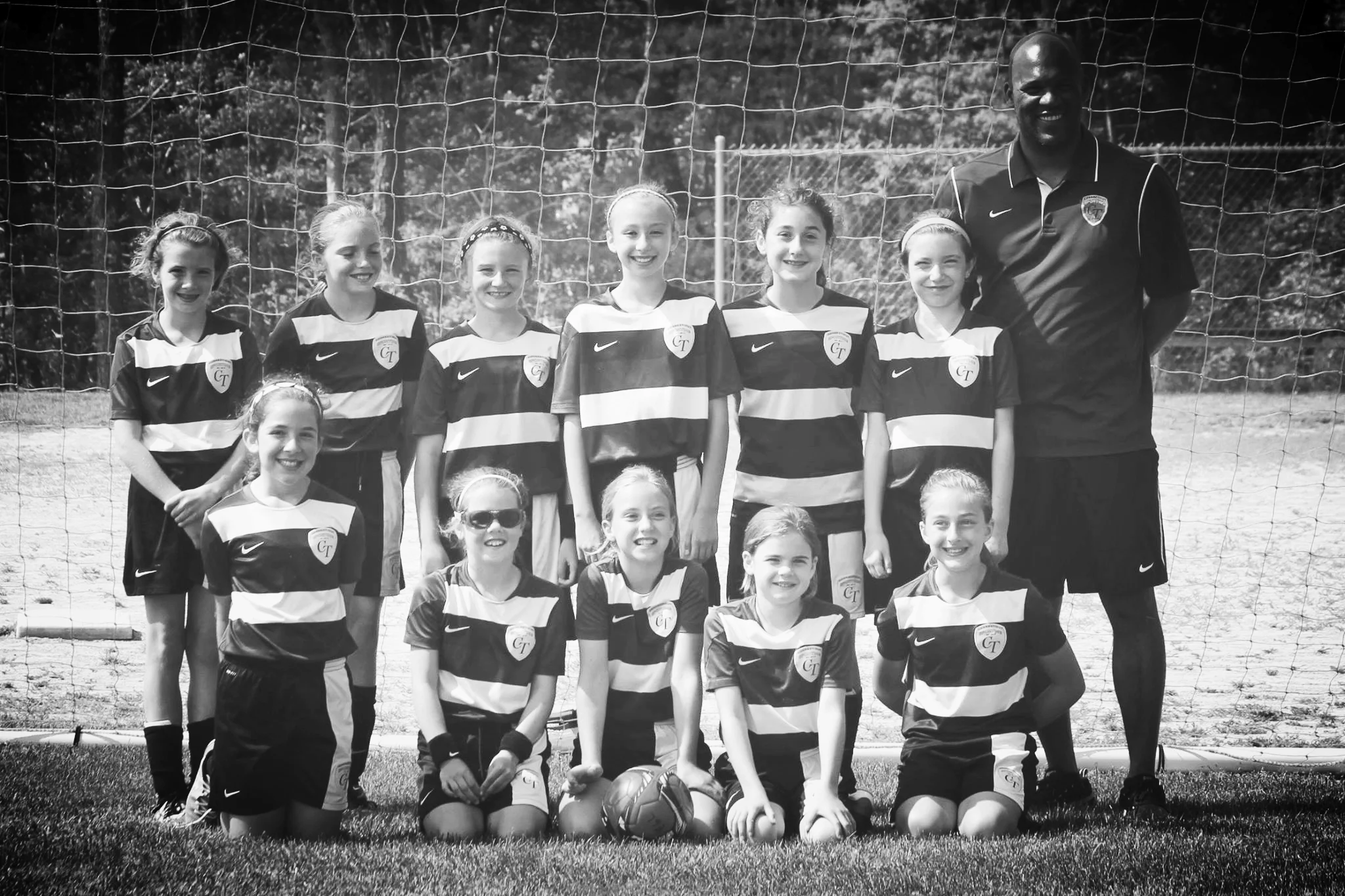 jermaine and u10 girls.jpg