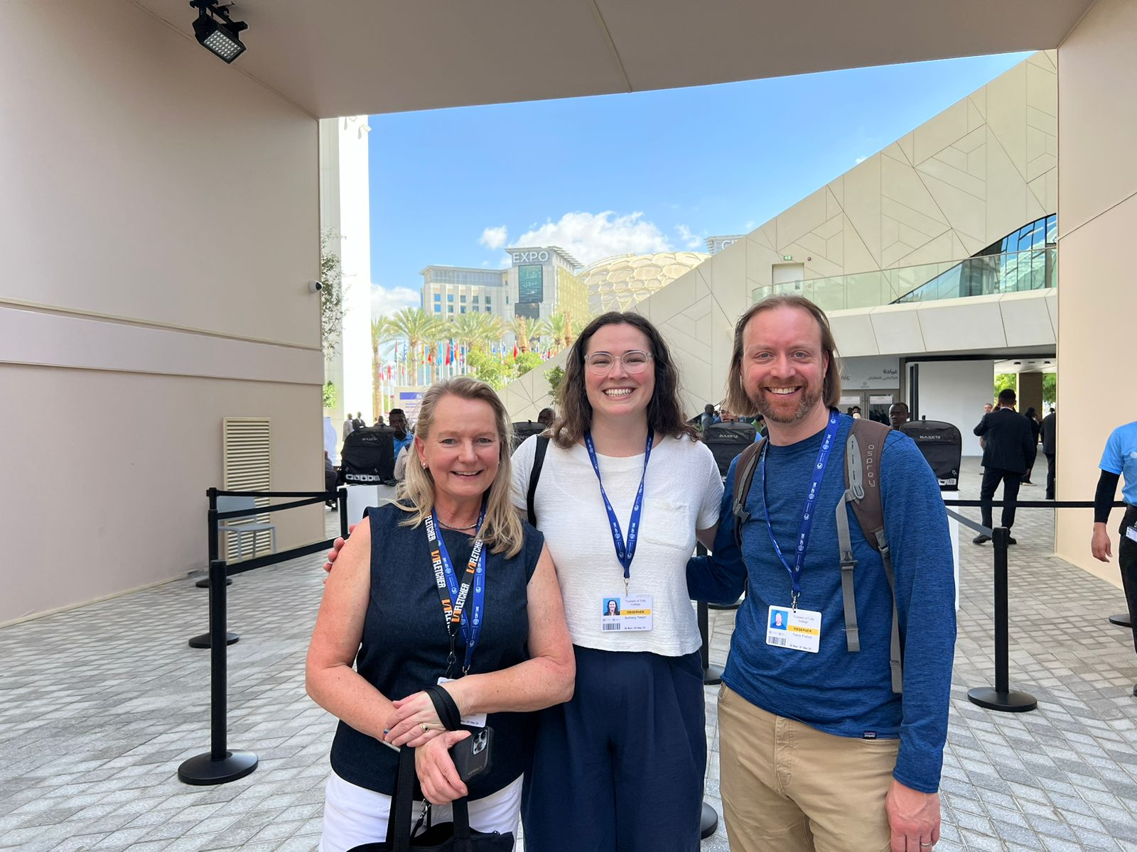 Mieke, Travis, and Bethany with Expo in background.png