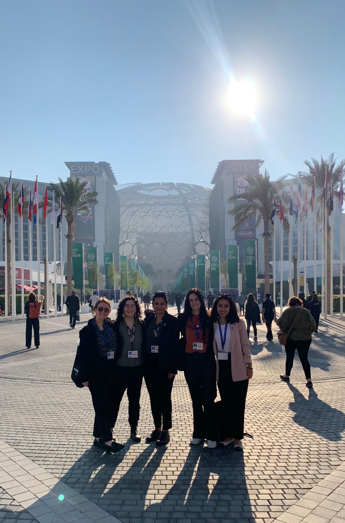 Aarushi, Selena, Alyssa, Shubhangi, and Alexandra in front COP28 entrance 2.png