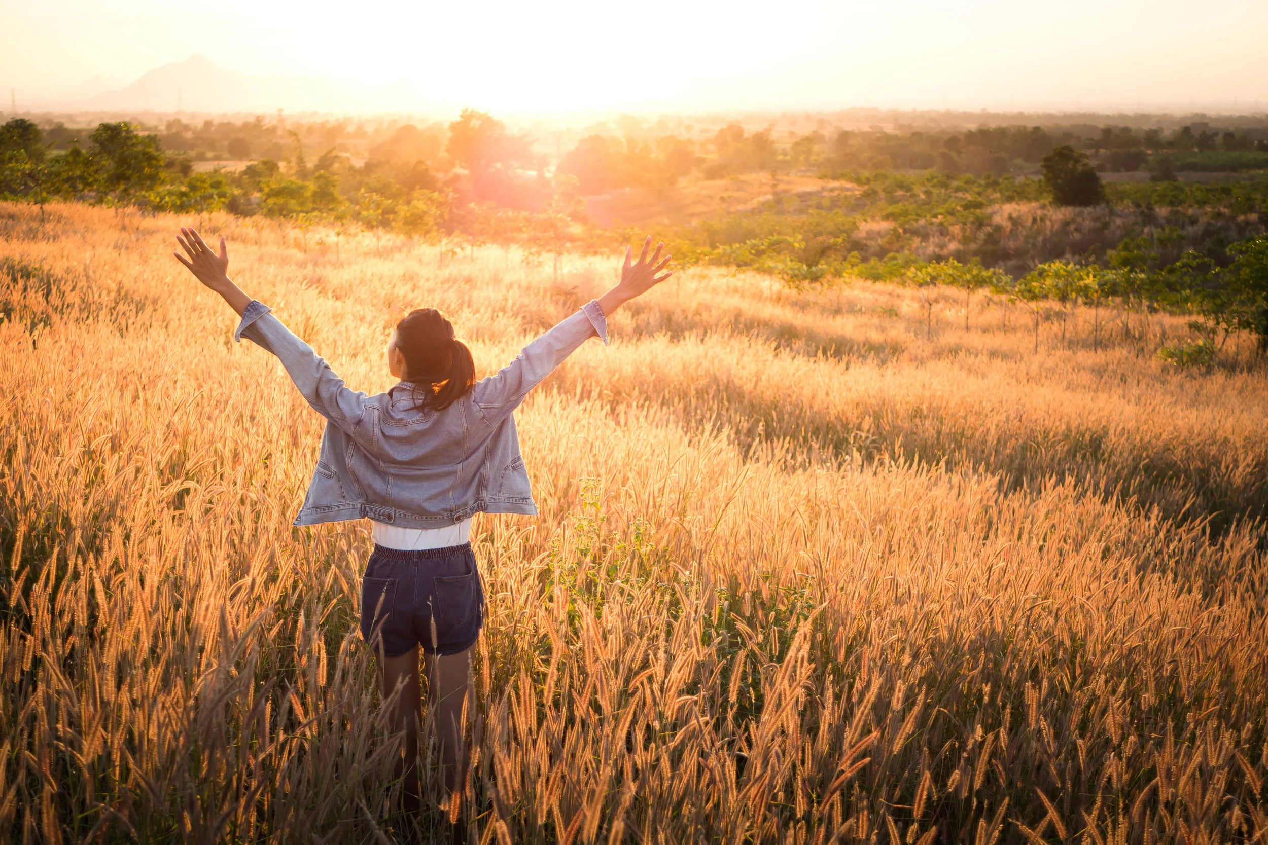 Joyful woman in meadow.jpg