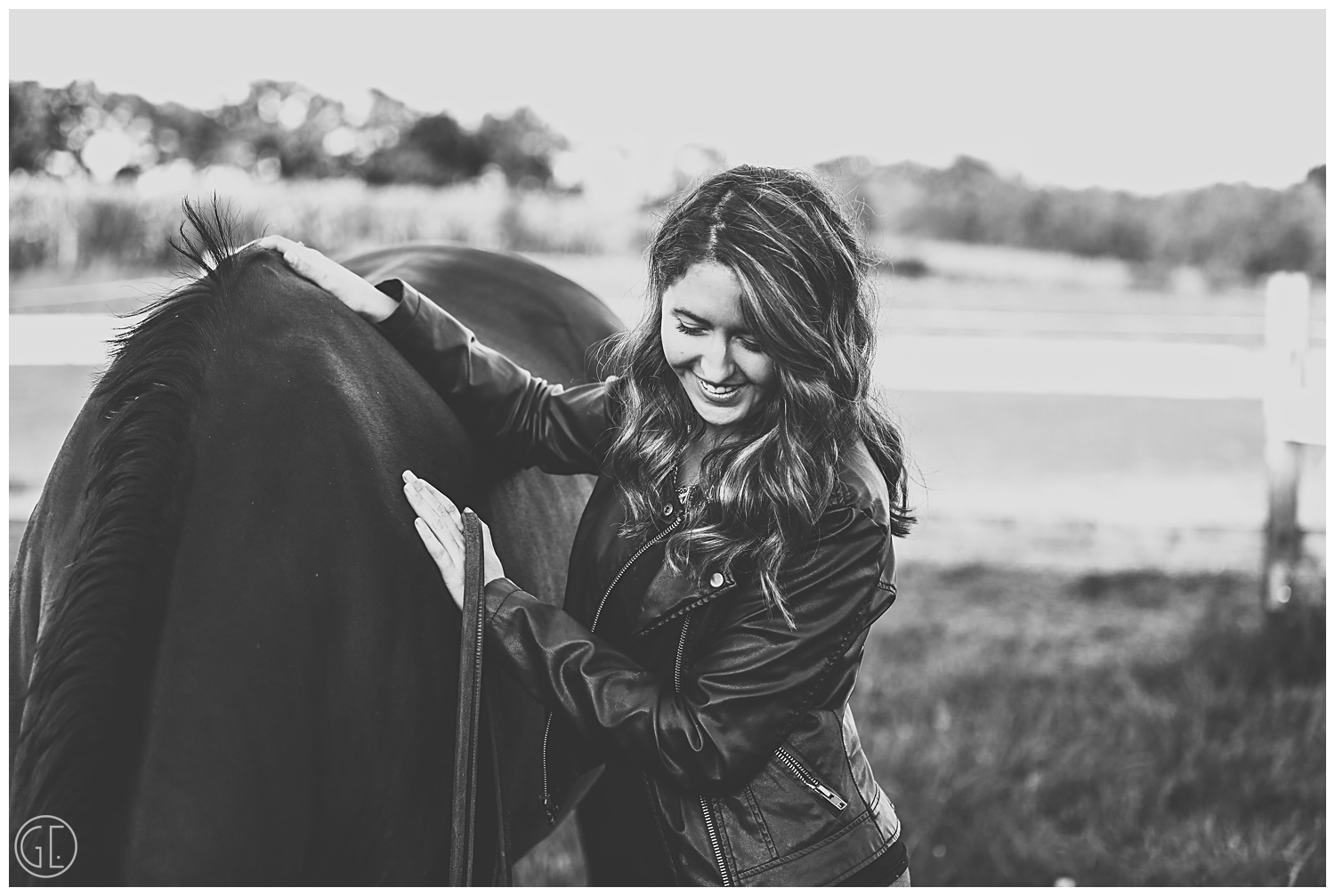 Girl looking down at horse