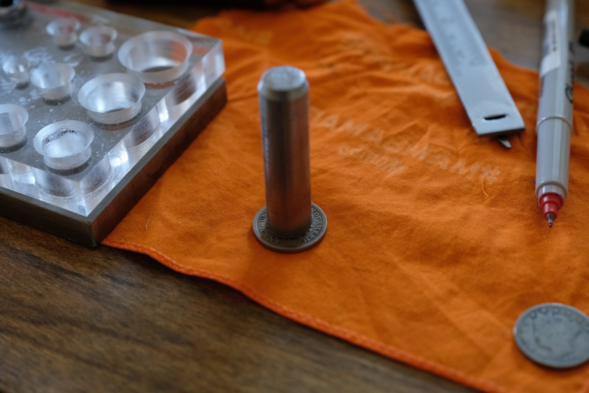  The hole in the coin needs to be as perfectly centered as possible. Tracing the punch will make it easier to center the coin on the die.&nbsp; 