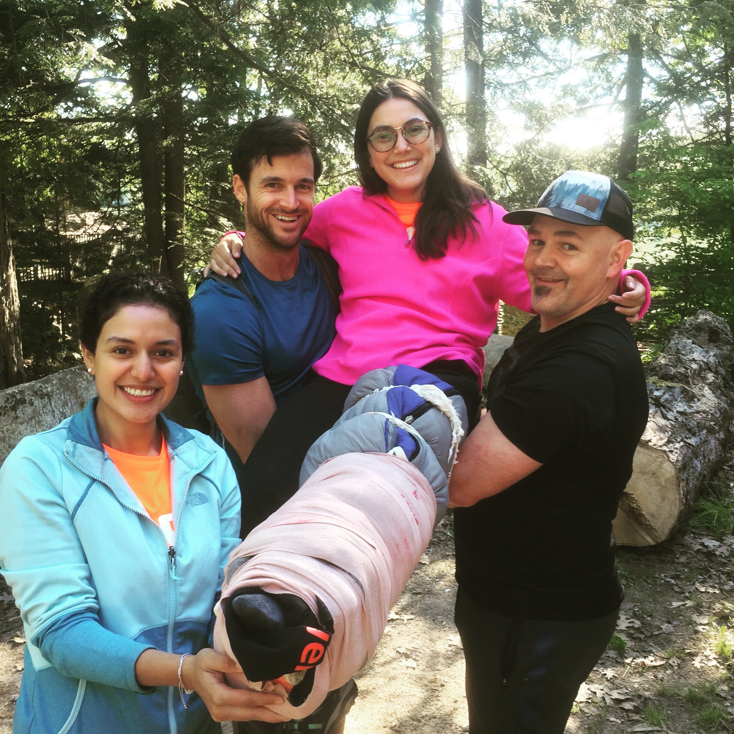 An international group of WFR students representing Monterrey, Mexico; Tulsa, Oklahoma; and Plattsburgh, NY show off their full leg splint.