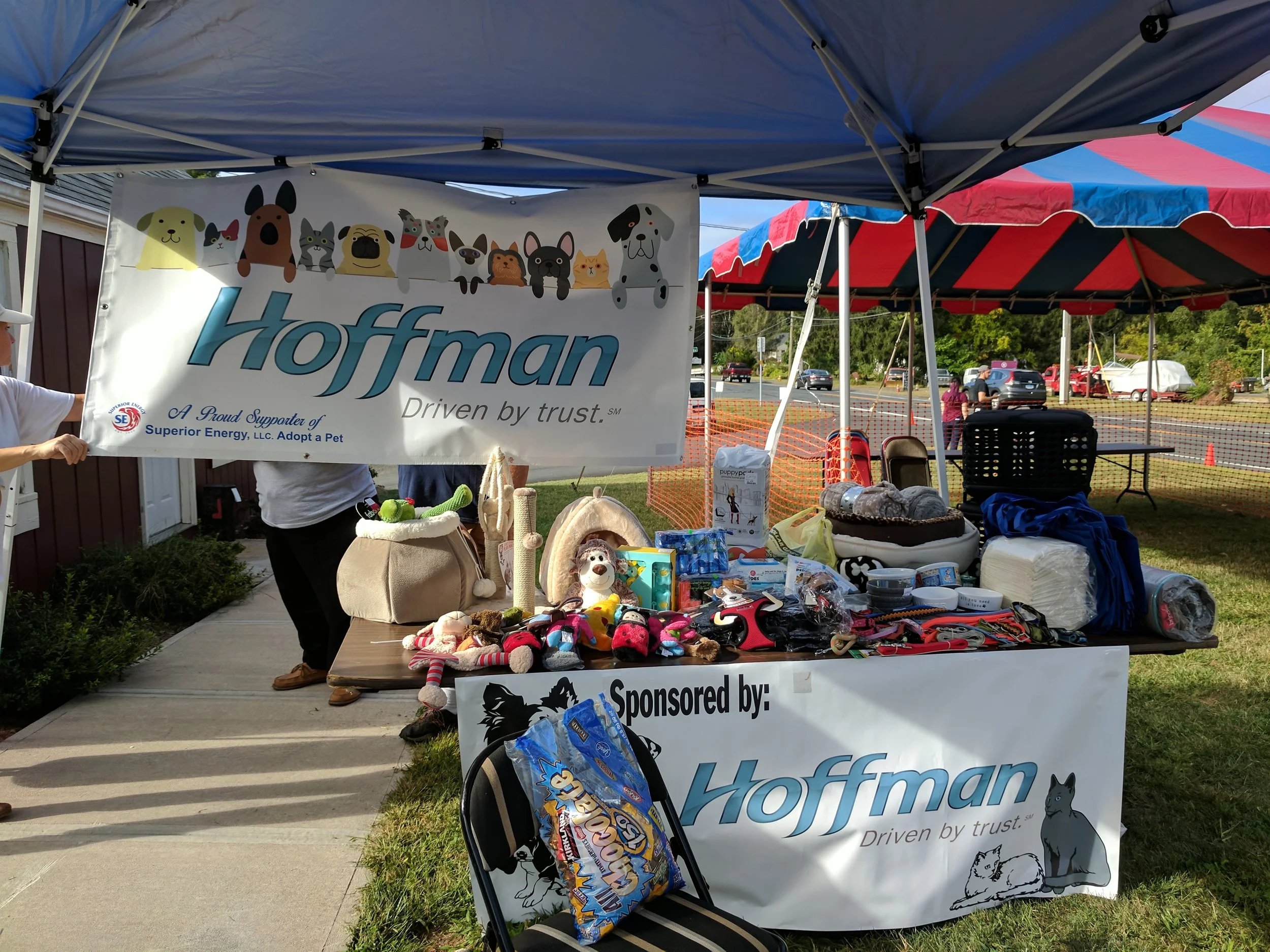 Thanks to the generosity of the Hoffman Auto Group , pet supplies like beds, food bowls, toys, and more were available for FREE to all the new adoptive families to take home with them.
