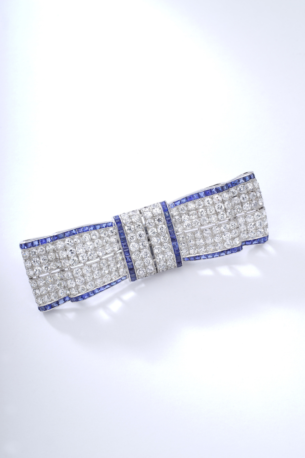Iskenderian Brooch Diamond calibrated Sapphire A16755.jpeg