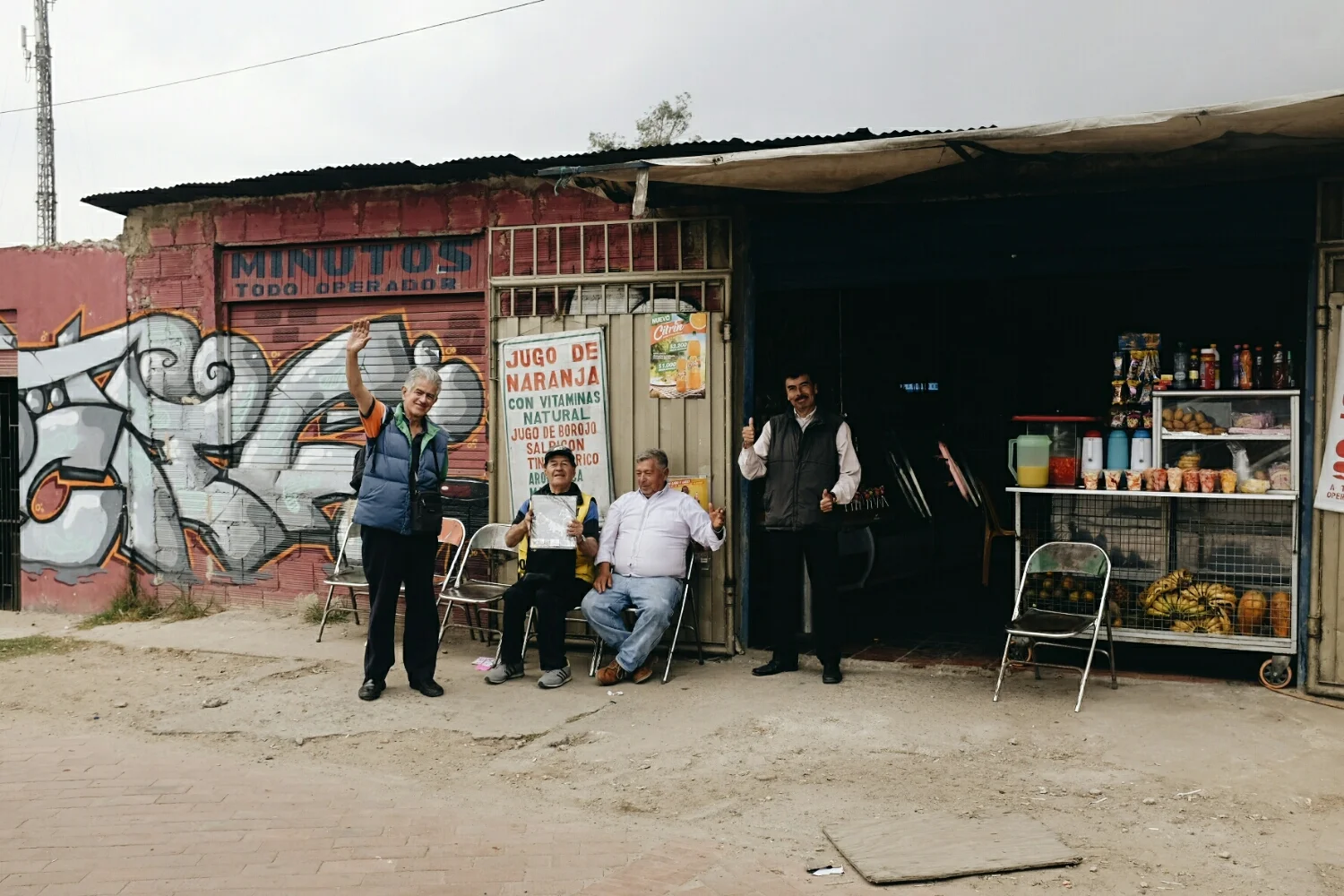 Welcome committee number 1: Cheerful men on the street.