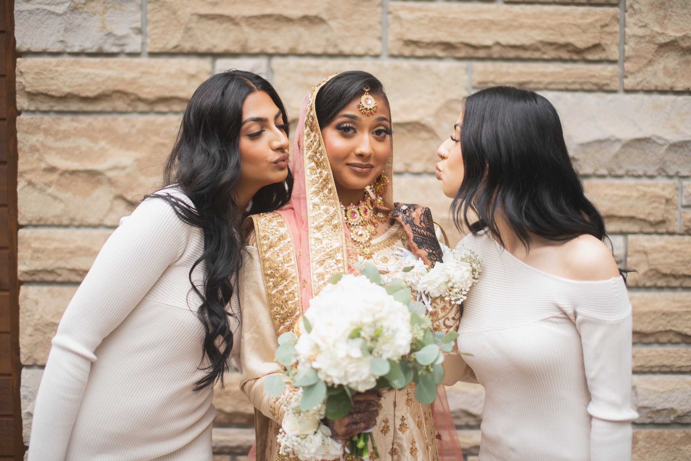 Zonera sharing a playful moment with two guests