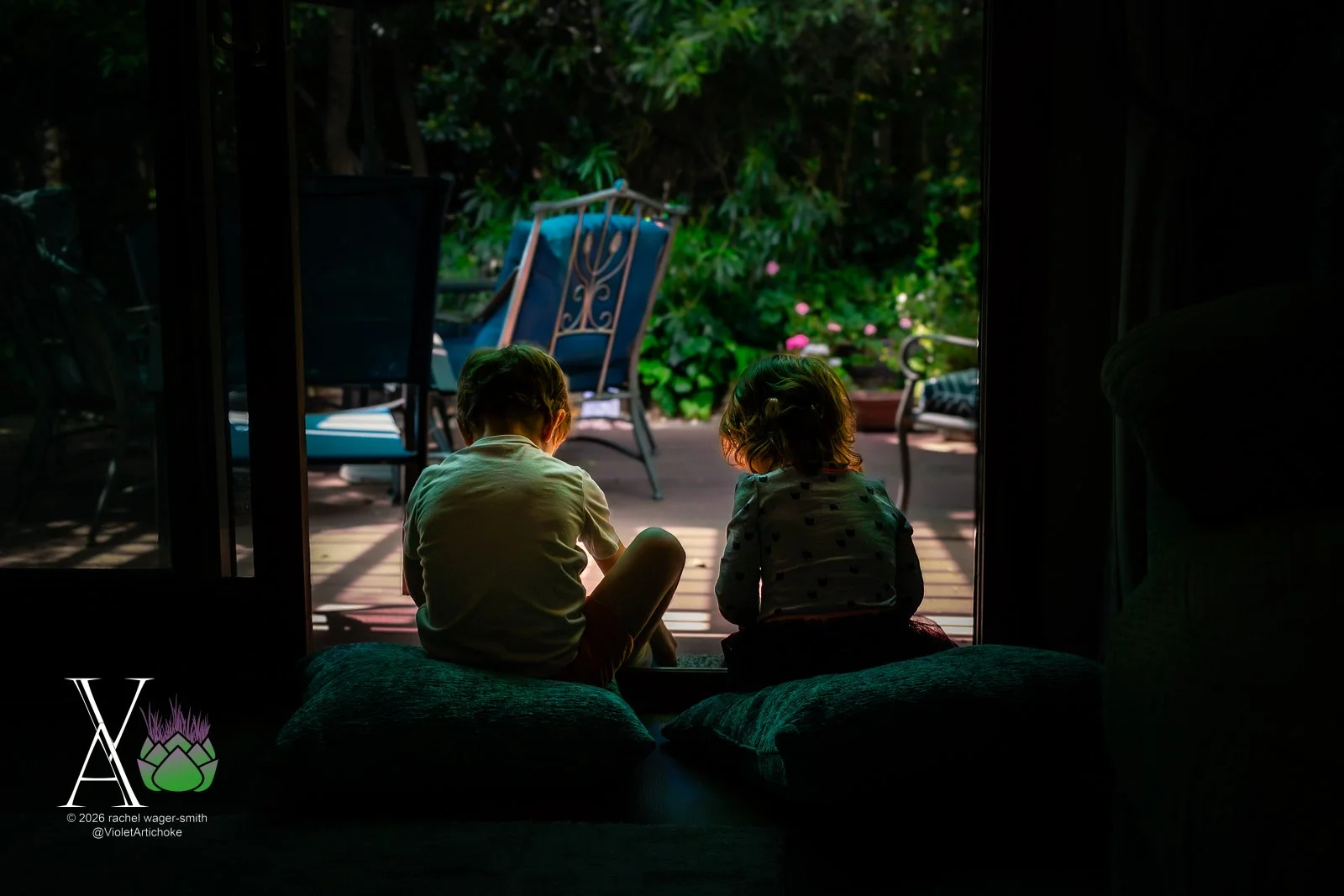 Two Children Look Outside