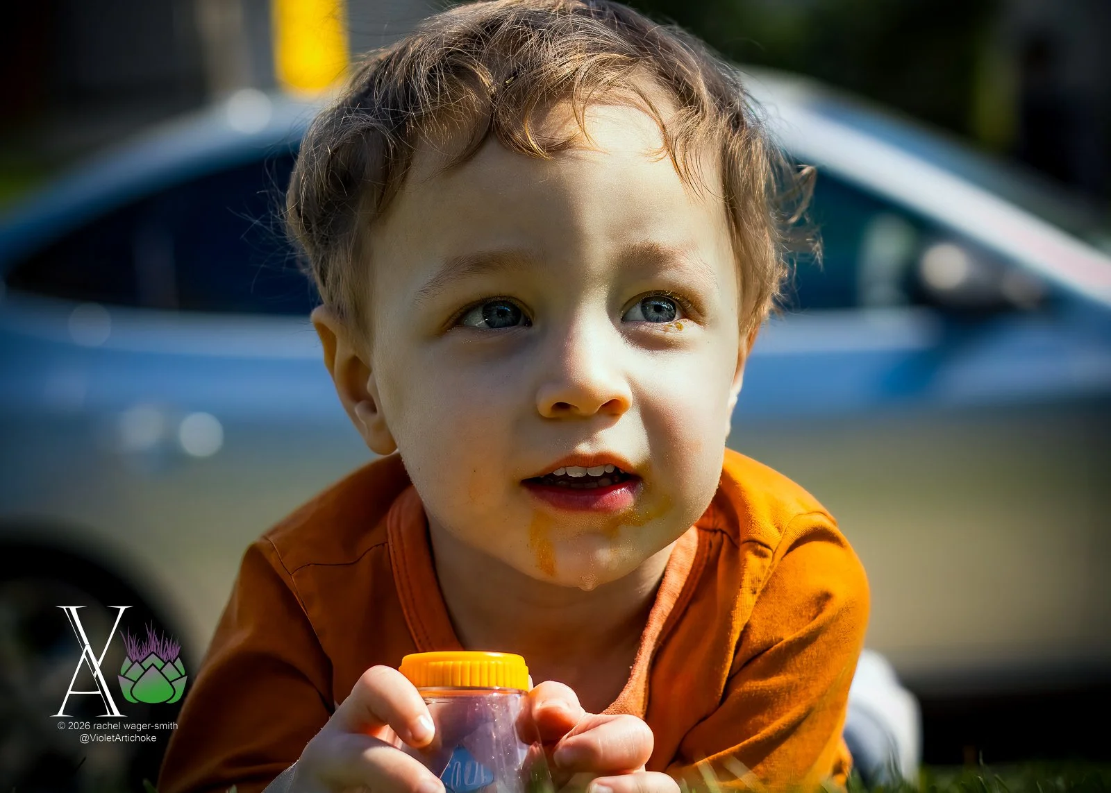 Young Boy with Magnifying Glass Container