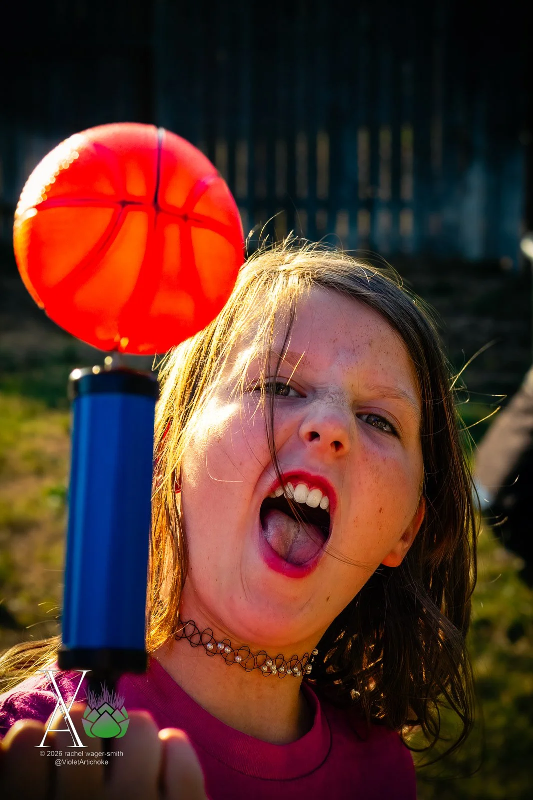 Girl Plays with Basketball and Pump
