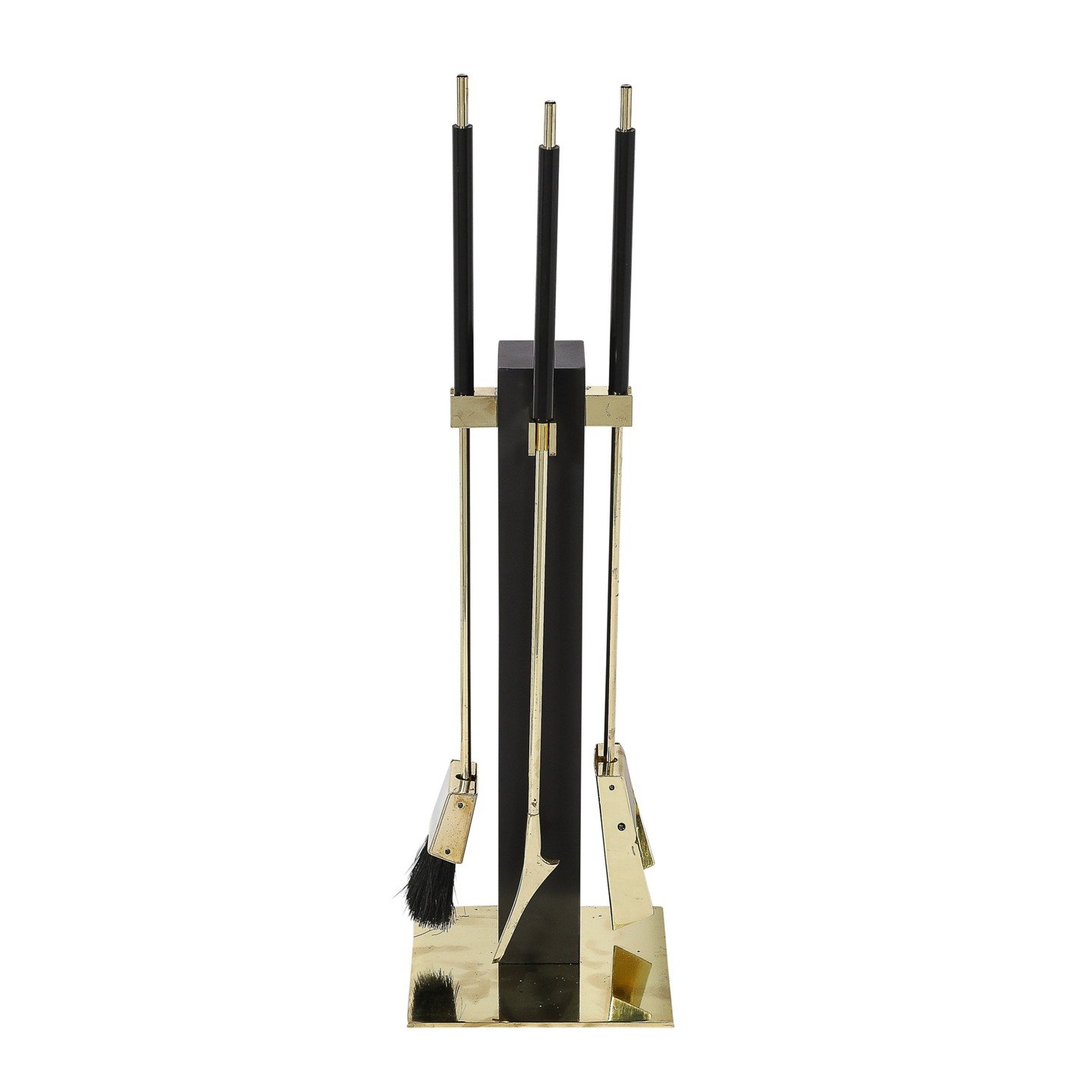 Mid-Century Modernist Three Piece Fire Tool Set in Brass by Alessandro Albrizzi

This sleek and sophisticated Mid-Century Modernist Three Piece Fire Tool Set in Polished Brass and Black Enamel by Alessandro Albrizzi originates from the Italy, Circa 1