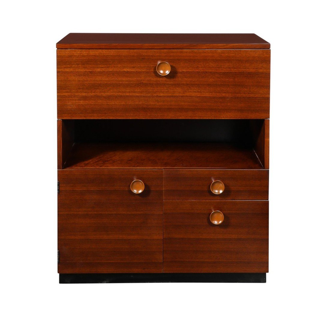 Art Deco Secretary Cabinet Desk in Book Matched Walnut by Gilbert Rohde

This rare and captivating Art Deco Drop Front Secreter Desk in Book-matched Hand-Rubbed Walnut is by the esteemed furniture designer Gilbert Rohde and originates from the United