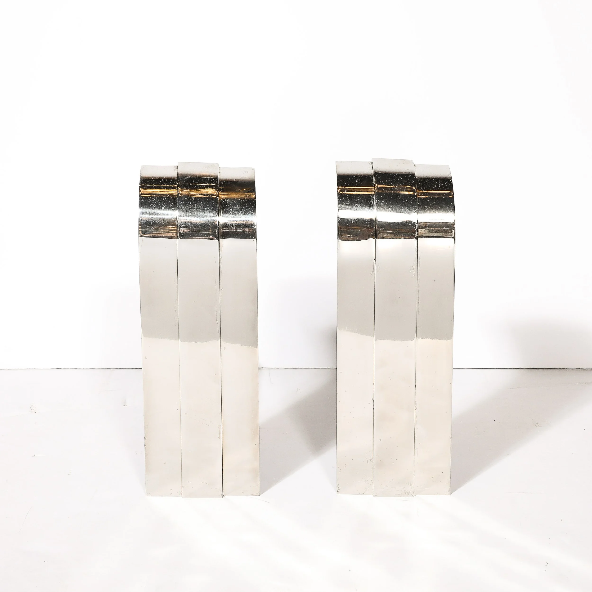 Pair of Mid-Century Curved Top Polished Nickel Andirons by Danny Alessandro - High Style Deco 1.jpg