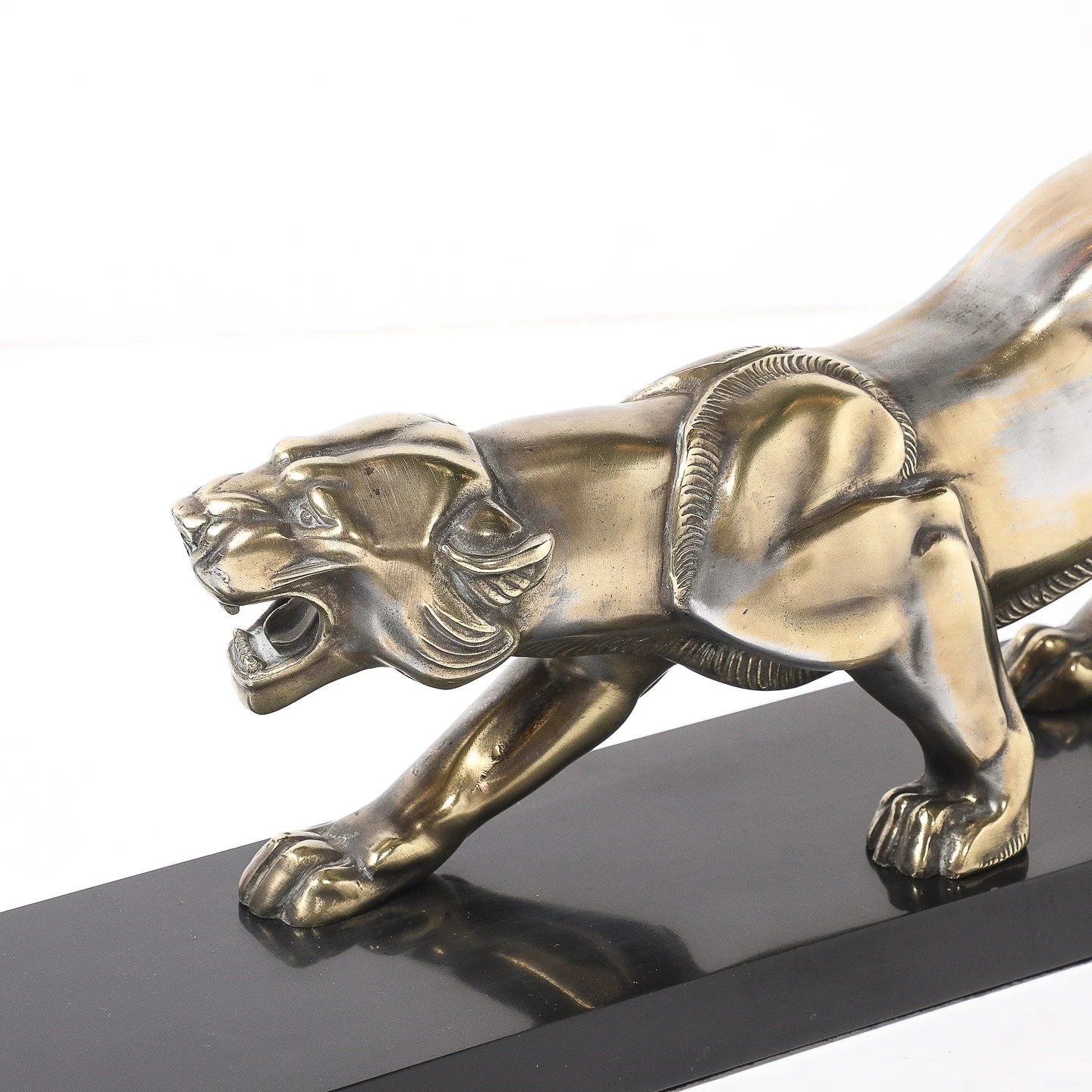 Art Deco Silvered Bronze Lion Sculpture on Black Marble Base

France, Circa 1930

Dimensions:

Height: 8 in (20.32 cm) x Width: 27.5 in (69.85 cm) x Depth: 8.25 in (20.96 cm)
.
.
.
.
.
#artdeco 
#vintageart 
#interiordecoration 
#interiordesign 
#art