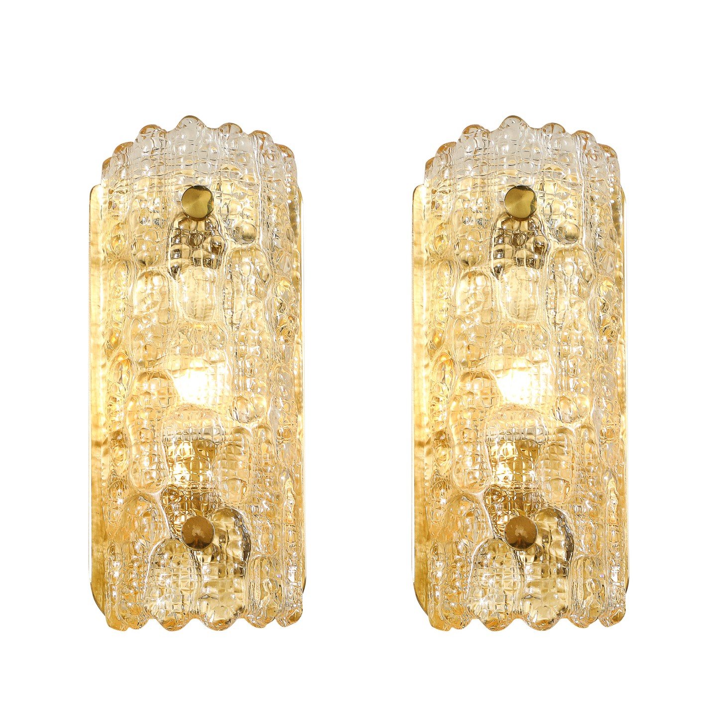 Pair of Mid-Century Mottled Honey Glass Sconces by Carl Fagerlund for Orrefors

Sweden, Circa 1960

Dimensions: 

Height: 11 in (27.94 cm) x Width: 5 in (12.7 cm) x Depth: 3 in (7.62 cm)

Creator: Orrefors (Maker), Carl Fagerlund (Designer)
.
.
.
.
.
