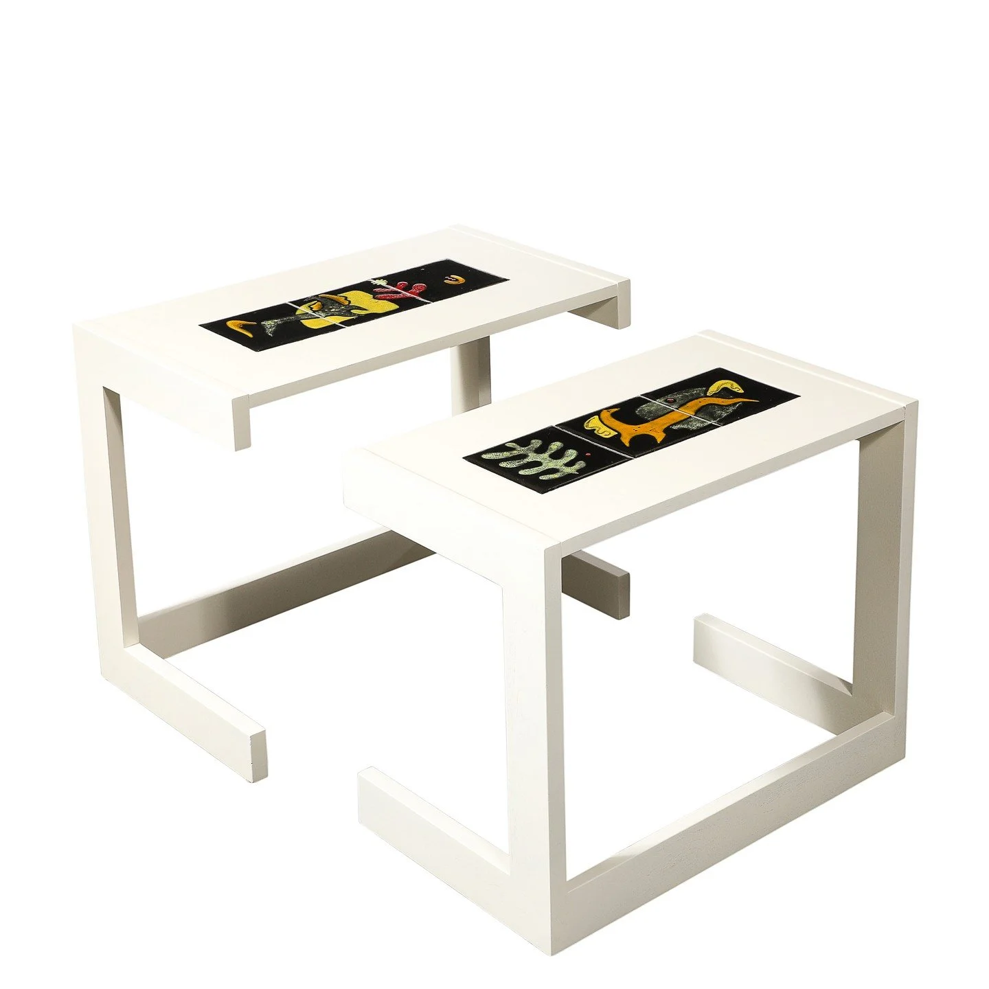 Pair of Documented Off White &amp; Inset Tile Vladimir Kagan Nested Side Tables

American, Circa 1950

Dimensions:

Outer - Height: 22.25" x Width: 28" x Depth: 16"

Inner - Height: 21" x Width: 25.5" x Depth: 15"

Creat
