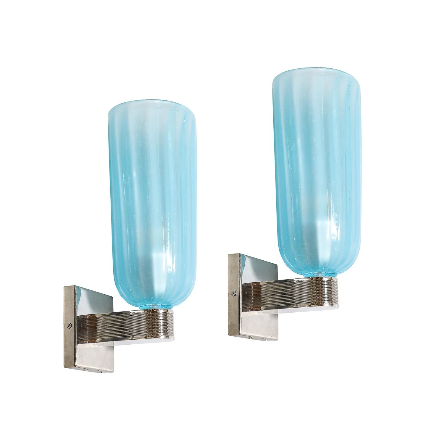 Pair of Modernist Hand-Blown Murano Arctic Blue Fluted Glass Sconces &amp; Nickel

Italy, 21st Century

Dimensions: 

Height: 15 in (38.1 cm) x Width: 7 in (17.78 cm) x Depth: 7.5 in (19.05 cm)
.
.
.
.
.
#muranoglass
#sconces
#interiordesigners
#inte