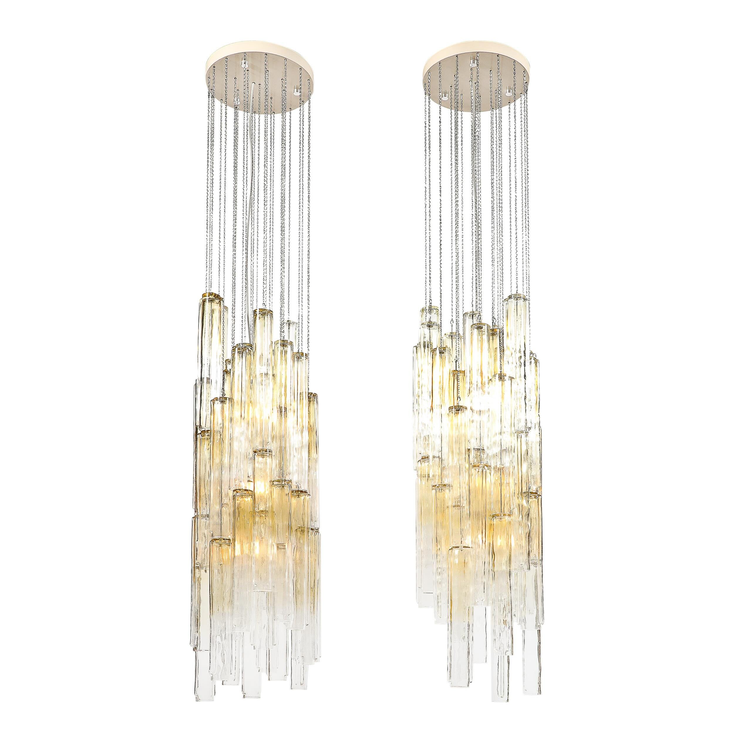Pair of Mid-Century Large Muted Citrine Calza Glass Chandeliers signed Venini

Italy, Circa 1960

Dimensions: 

Overall Height: 69 in (175.26 cm) x Diameter: 13 in (33.02 cm)

Body Height: 44&rdquo;

Creator: Venini (Maker)
.
.
.
.
#veninichandelier 