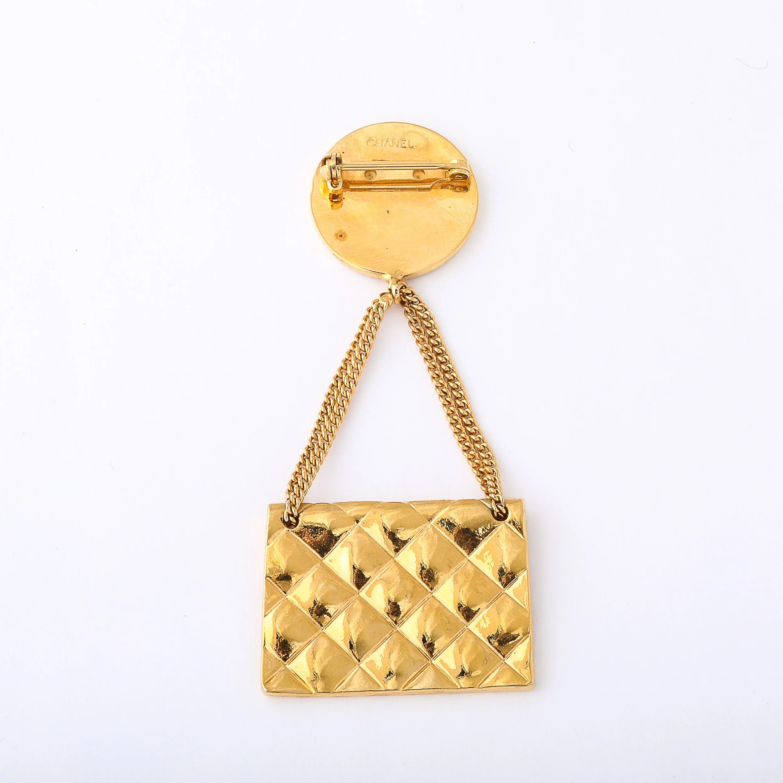 Vintage Chanel Gold-Plated Rue Cambon Quilted Bag Brooch offered by High Style Deco — image 10