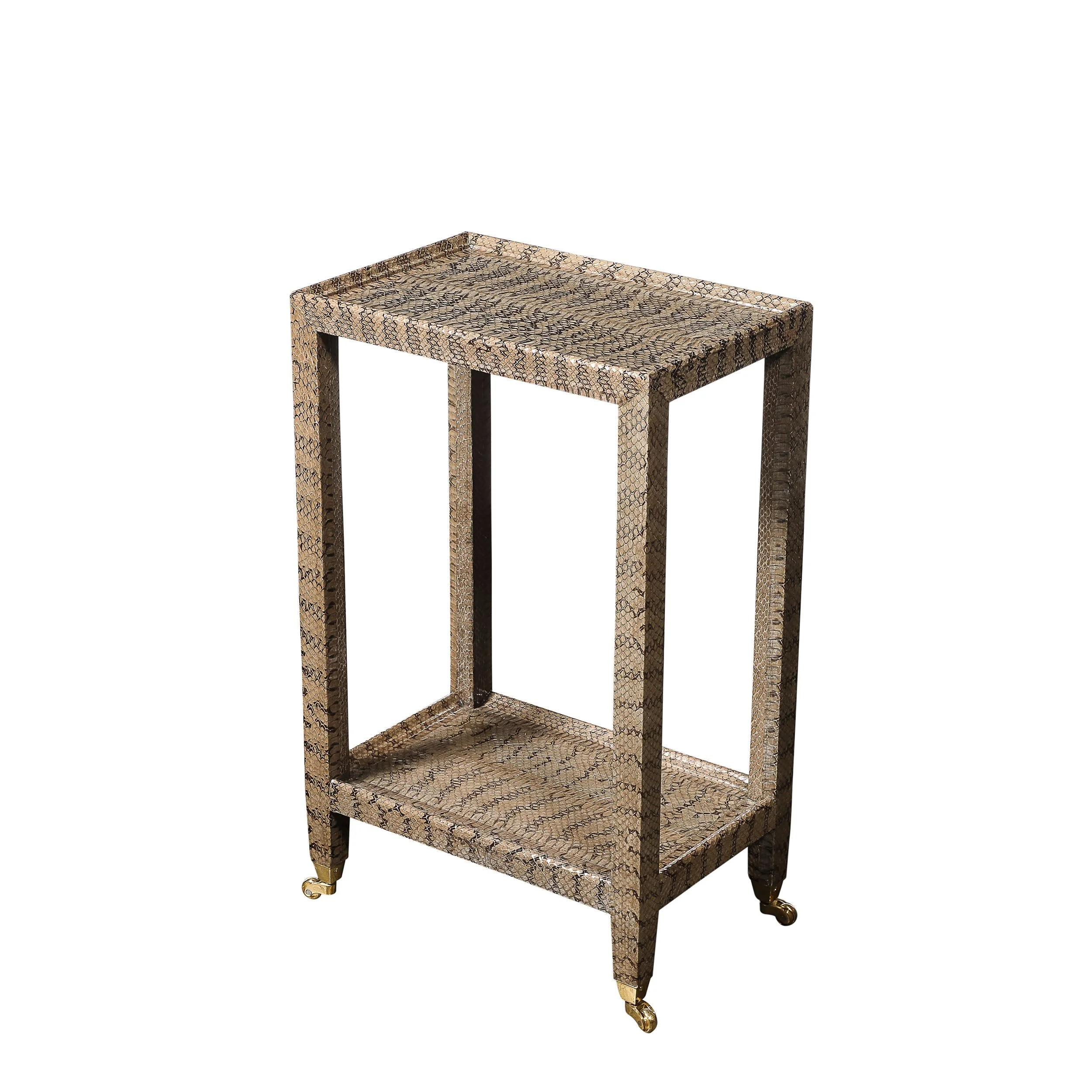 Mid-Century Modernist Python Side Table with Brass Castors by Karl Springer

American, Circa 1980

Dimensions: 

Height: 23.25 in (59.06 cm) x Width: 14.4 in (36.58 cm) x Depth: 9.5 in (24.13 cm)

Creator: Karl Springer (Maker)
.
.
.
#karlspringer #v