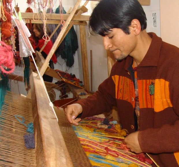Alex Gallardo at the loom, 2008.